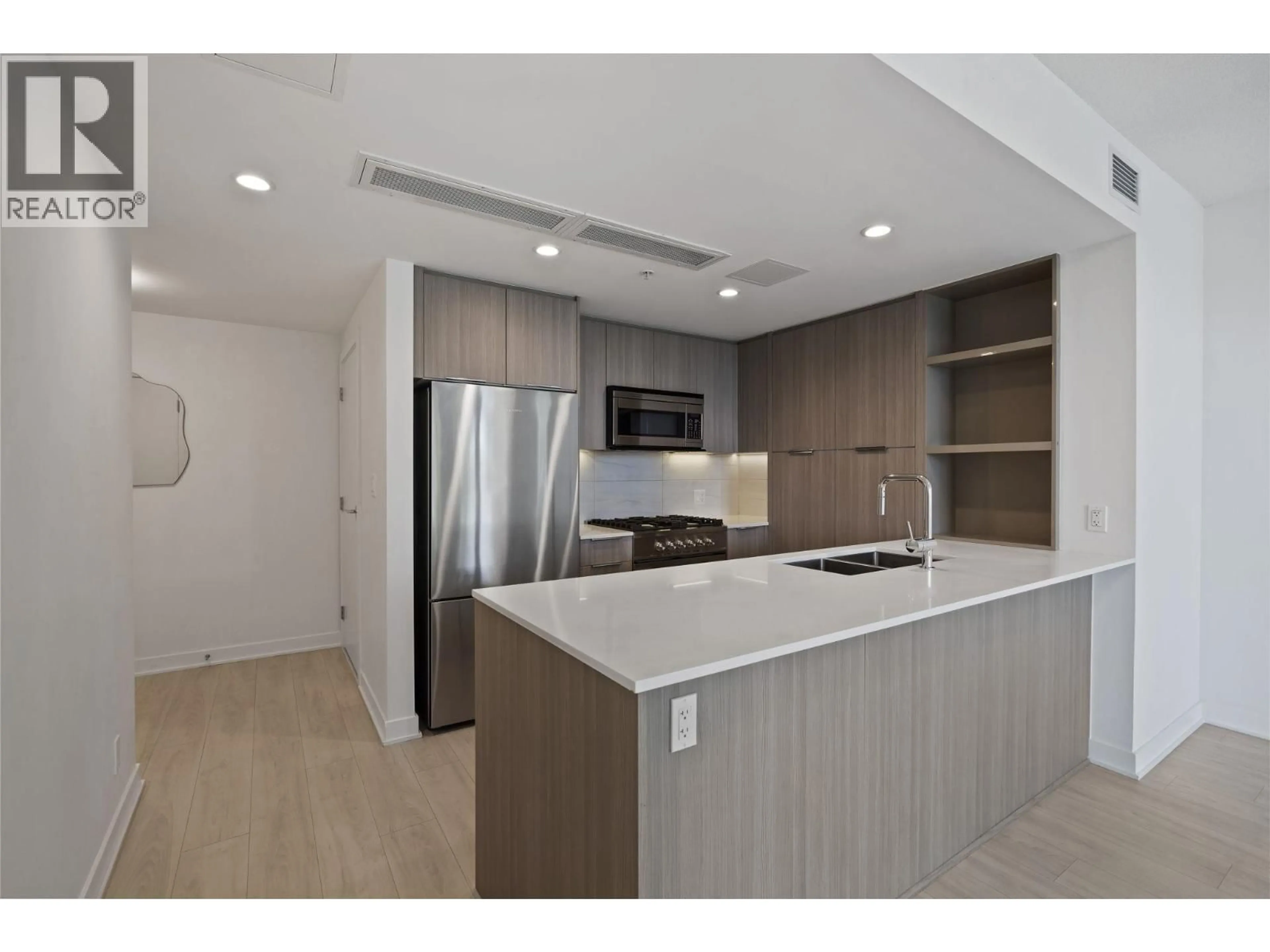 Open concept kitchen, unknown for 303 - 1401 HUNTER STREET, North Vancouver British Columbia V7J0E2