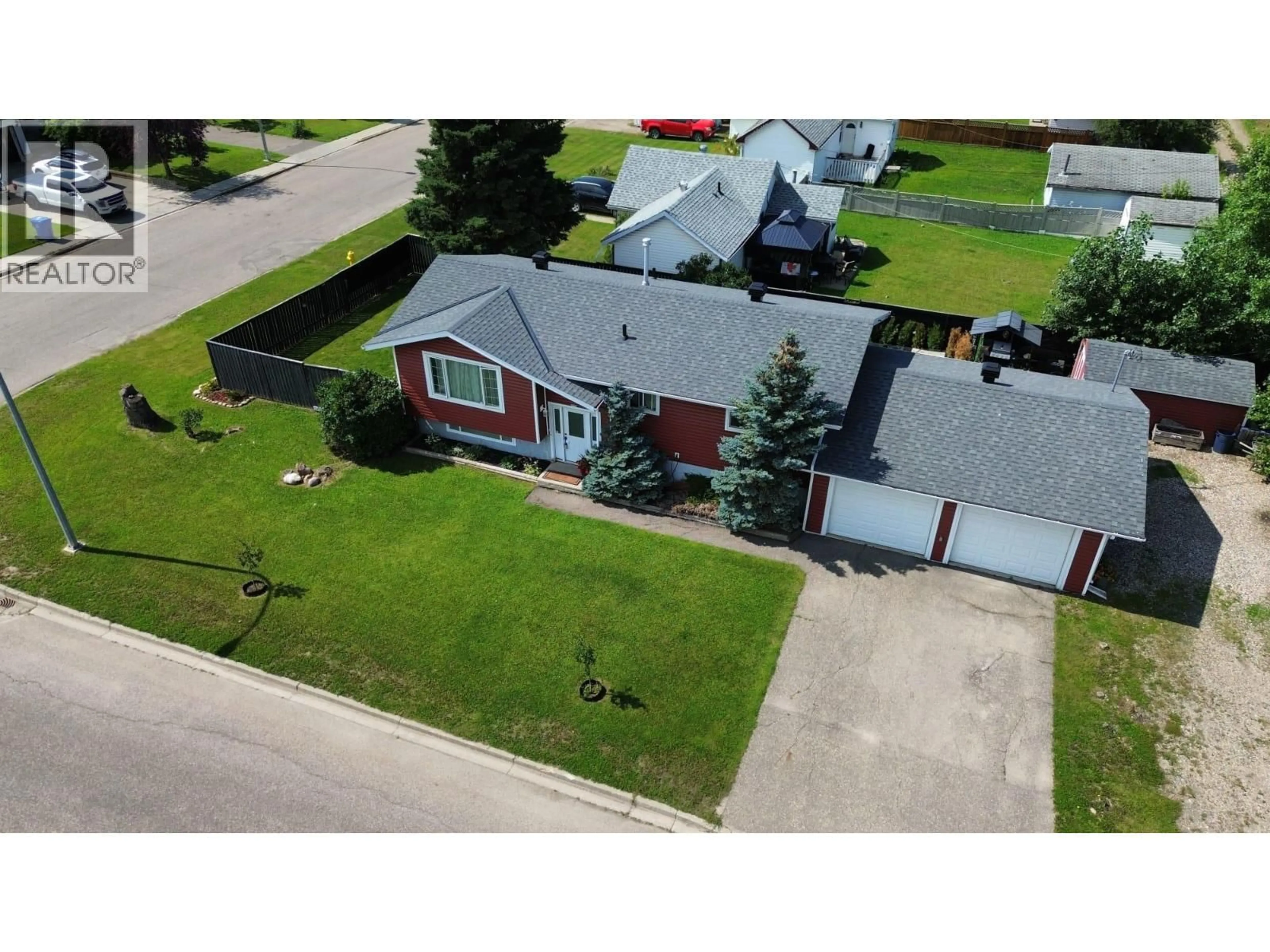 A pic from outside/outdoor area/front of a property/back of a property/a pic from drone, street for 10604 92 STREET, Fort St. John British Columbia V1J3J3