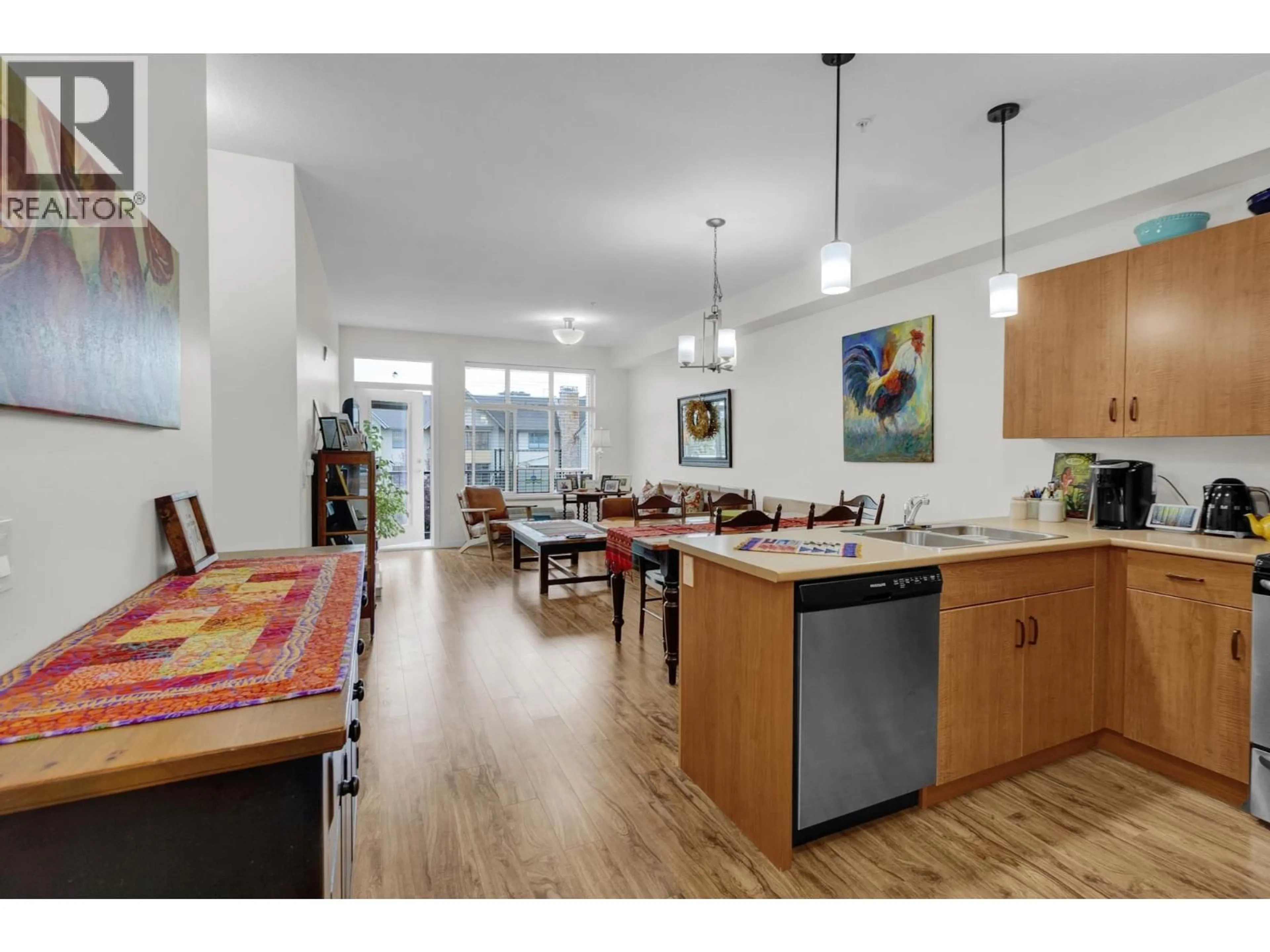 Open concept kitchen, wood/laminate floor for 327 - 1444 20TH AVENUE, Prince George British Columbia V2L0C9