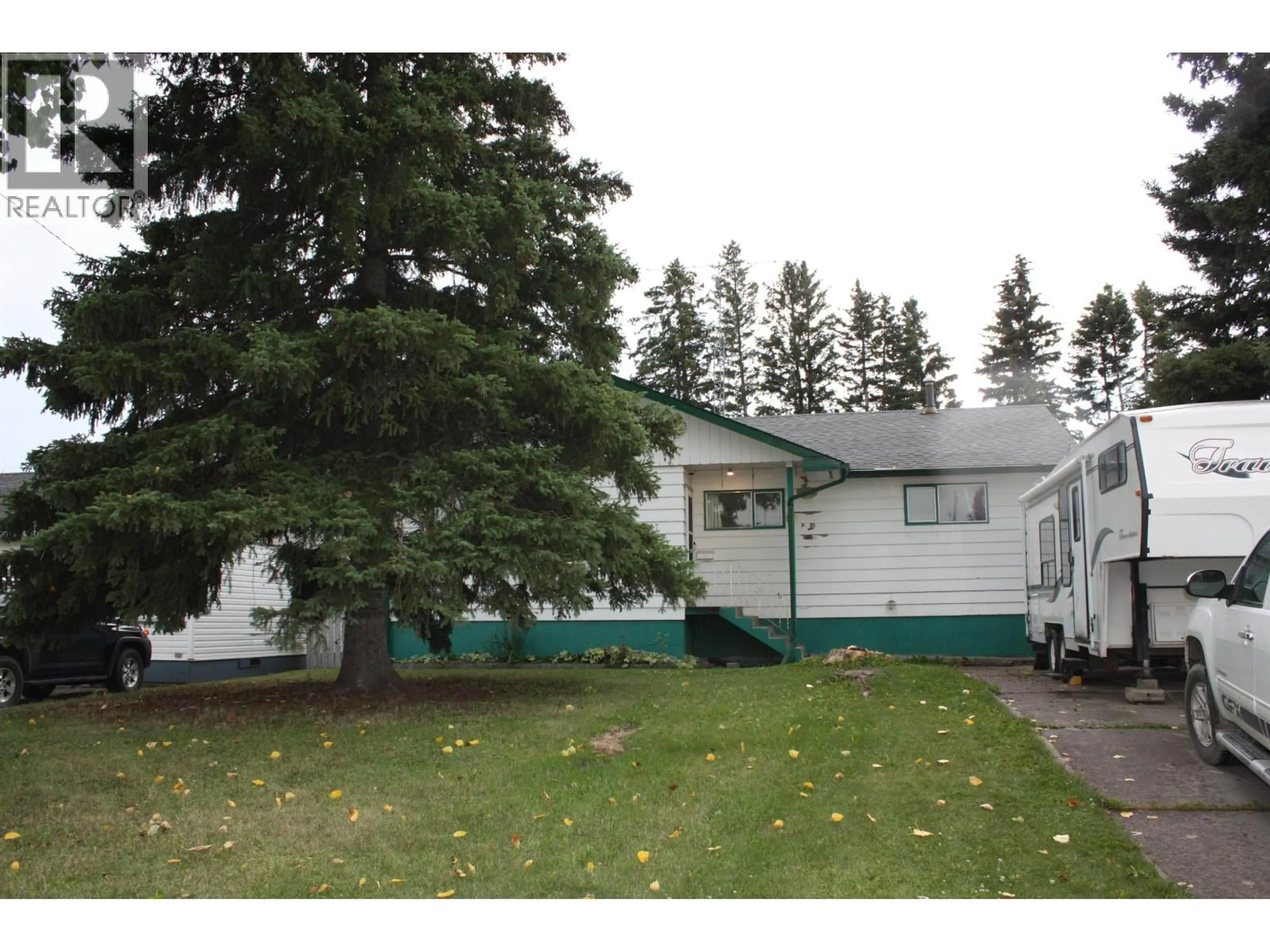 Home with vinyl exterior material, street for 9627 107 AVENUE, Fort St. John British Columbia V1J2P5