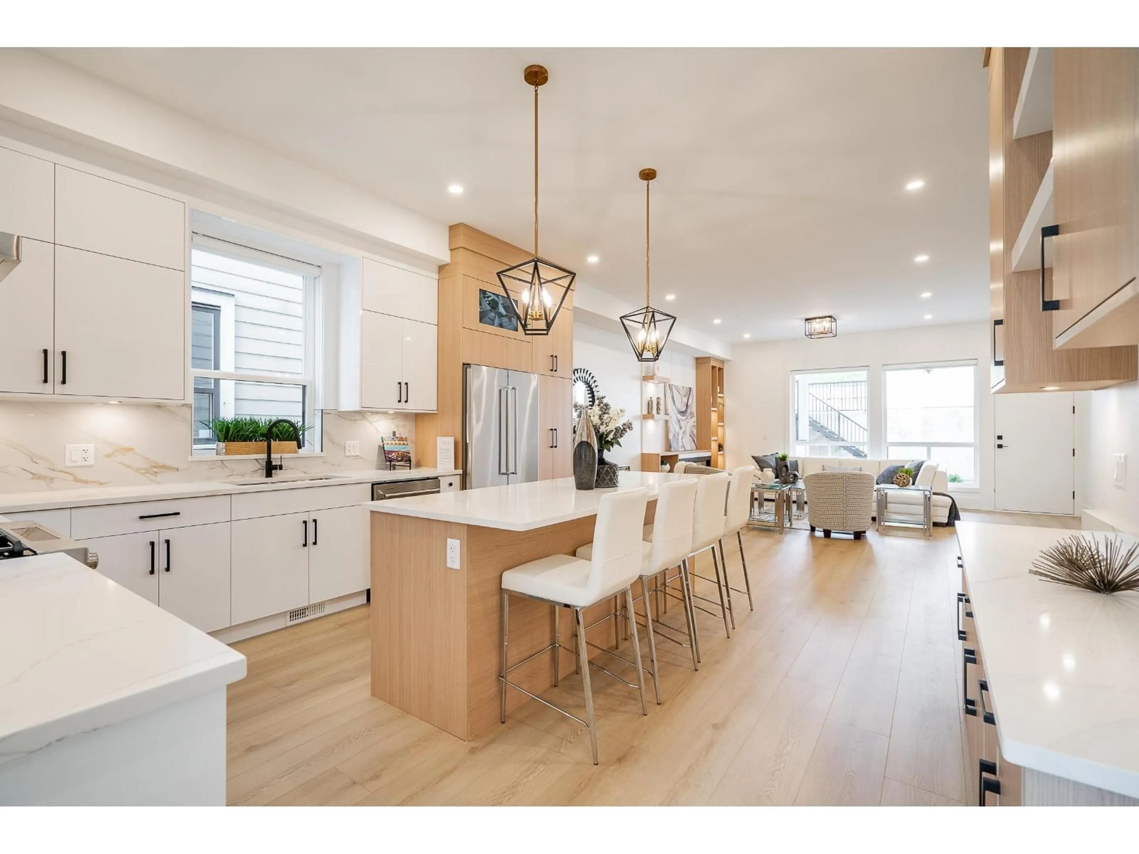 Open concept kitchen, wood/laminate floor for 16681 16, Surrey British Columbia V3S9X7