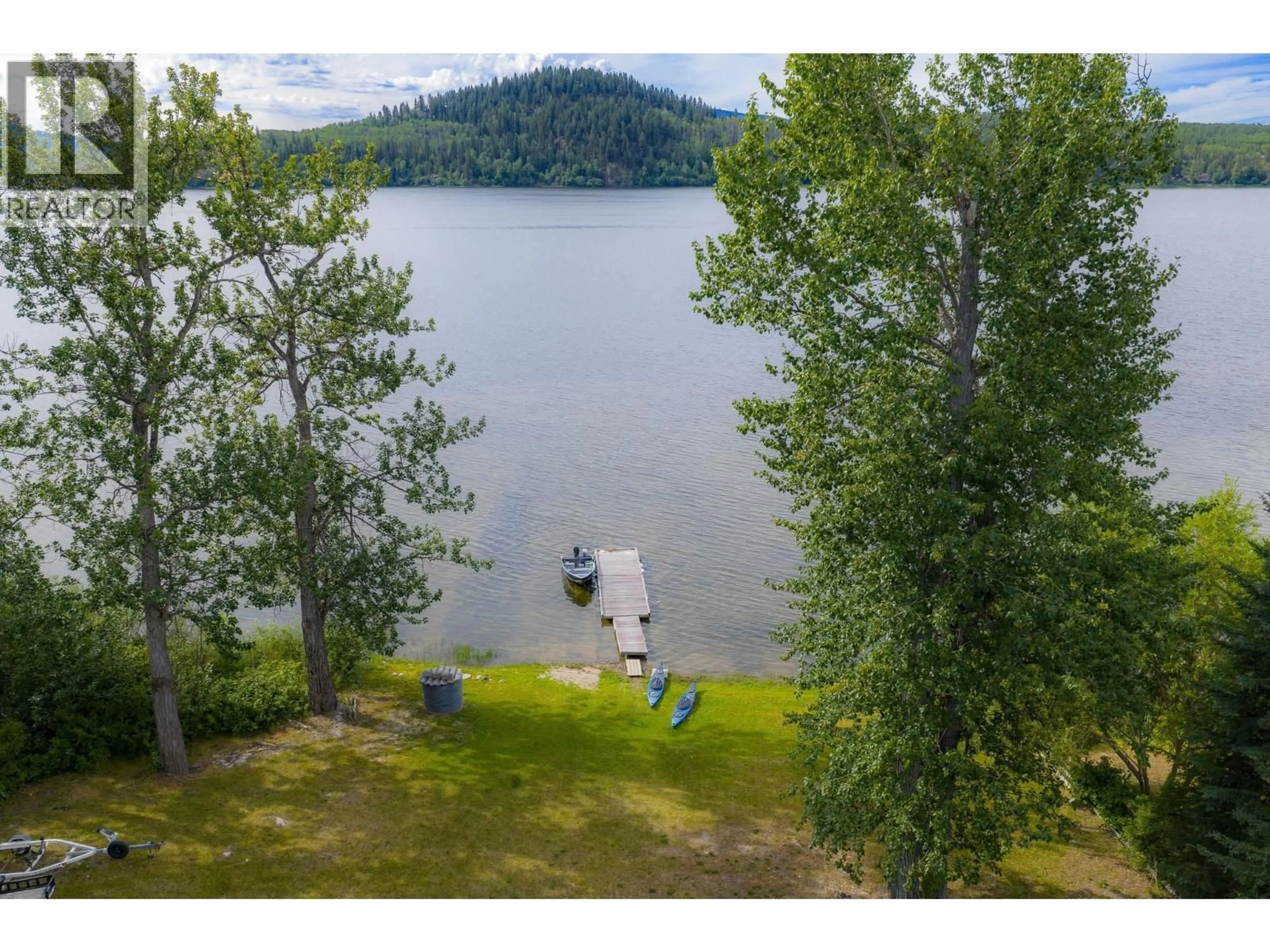 A pic from outside/outdoor area/front of a property/back of a property/a pic from drone, water/lake/river/ocean view for 5965 MCKENZIE ROAD, Fraser Lake British Columbia V0J1S0