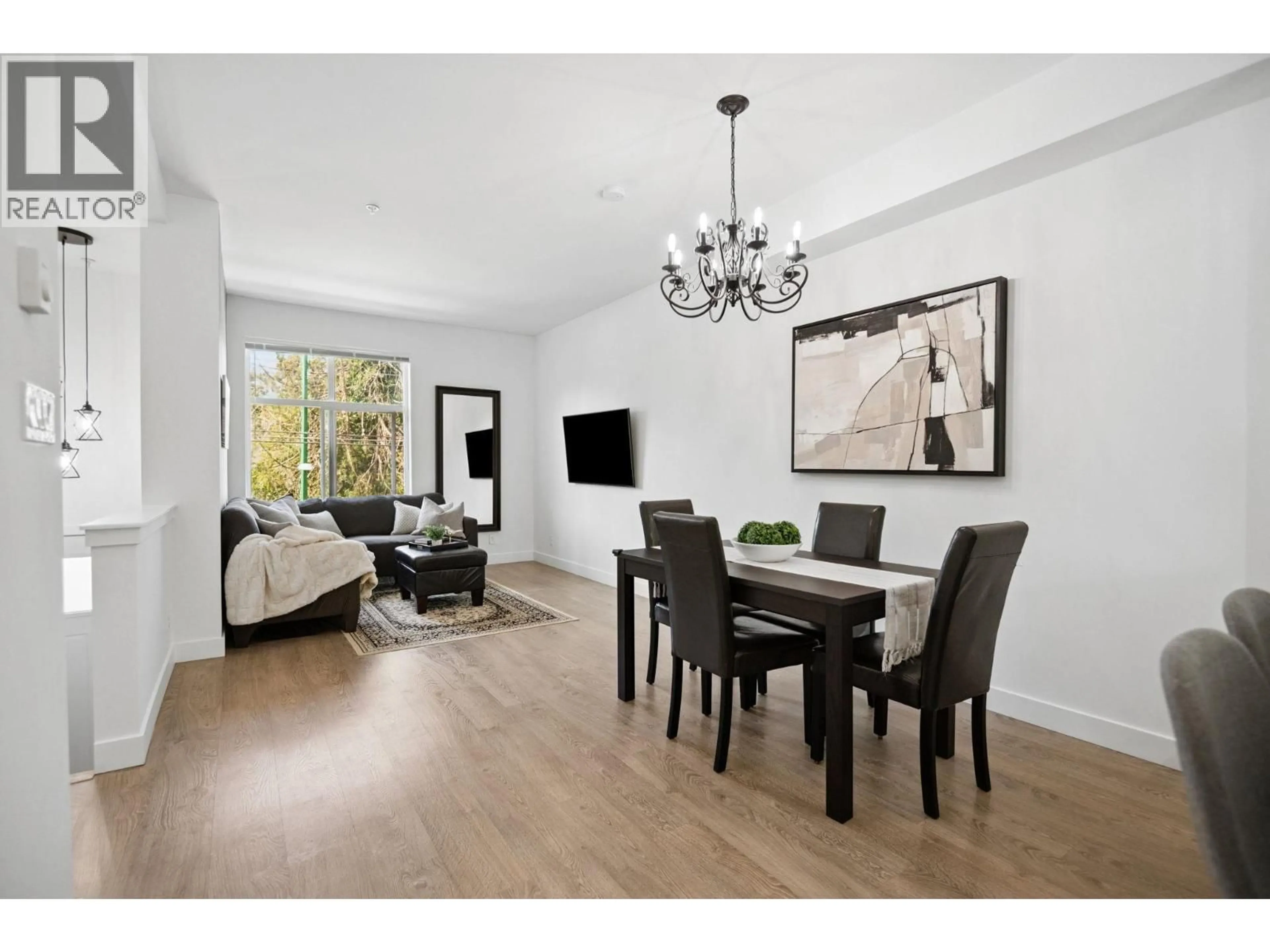 Dining room, wood/laminate floor for 207 - 7250 18TH AVENUE, Burnaby British Columbia V3N1H3