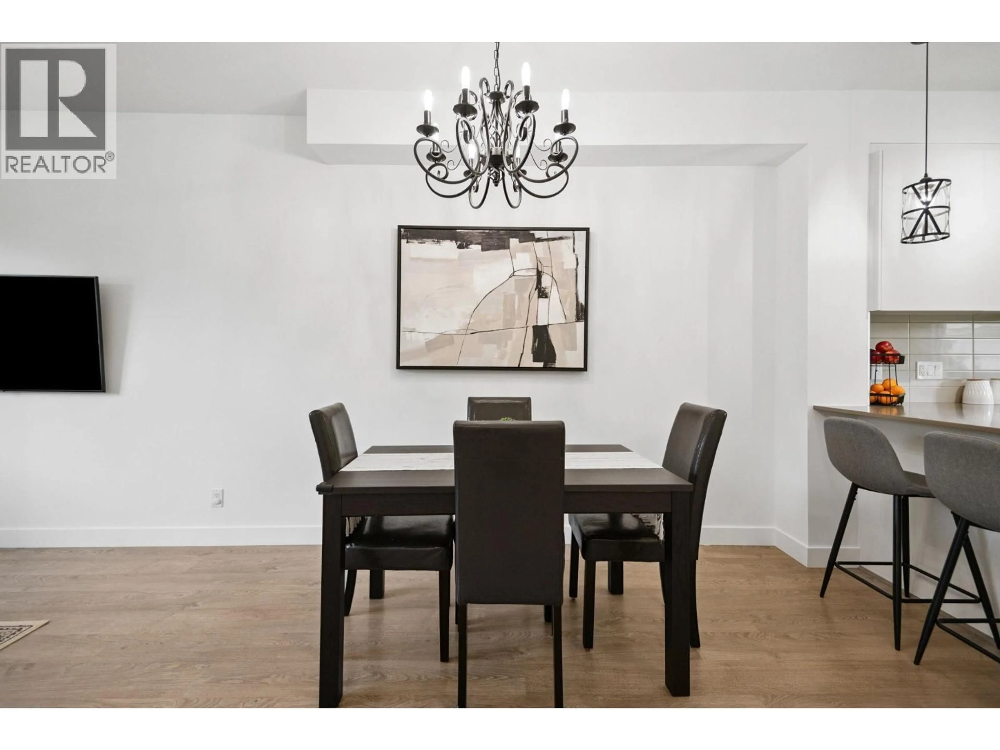 Dining room, wood/laminate floor for 207 - 7250 18TH AVENUE, Burnaby British Columbia V3N1H3
