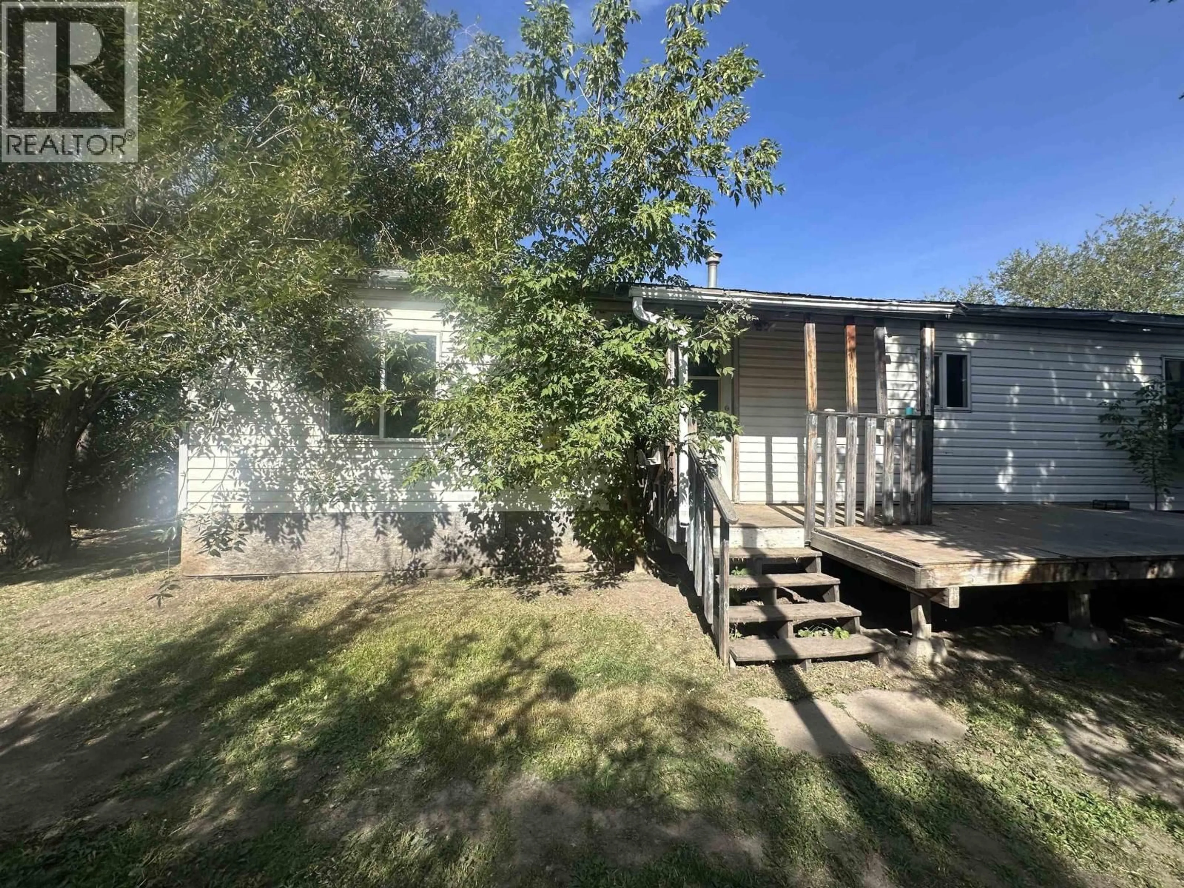 A pic from outside/outdoor area/front of a property/back of a property/a pic from drone, unknown for 8724 75 STREET, Fort St. John British Columbia V1J2Y8
