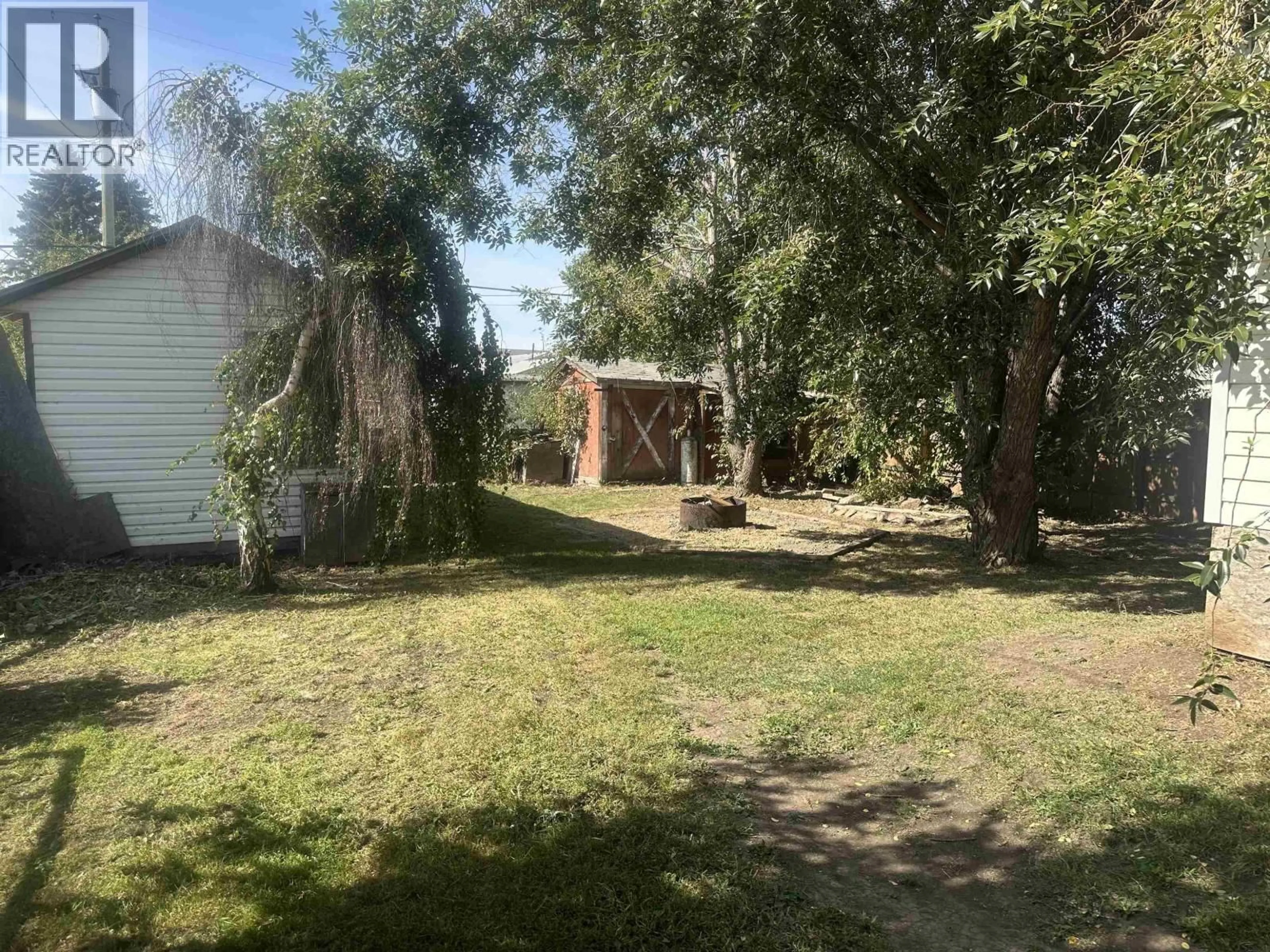 A pic from outside/outdoor area/front of a property/back of a property/a pic from drone, street for 8724 75 STREET, Fort St. John British Columbia V1J2Y8