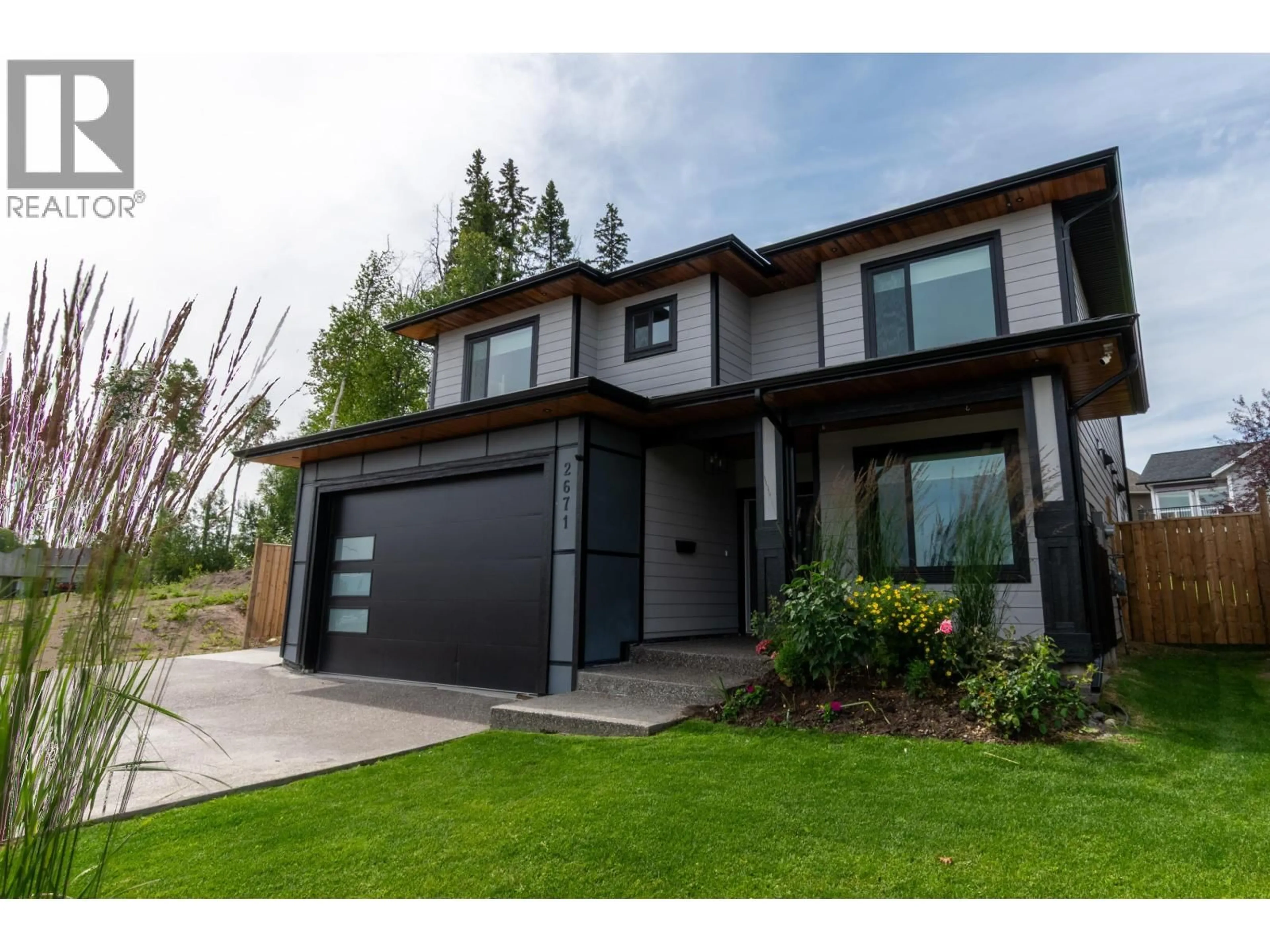 Home with vinyl exterior material, street for 2671 CHANCELLOR BOULEVARD, Prince George British Columbia V2N0E6