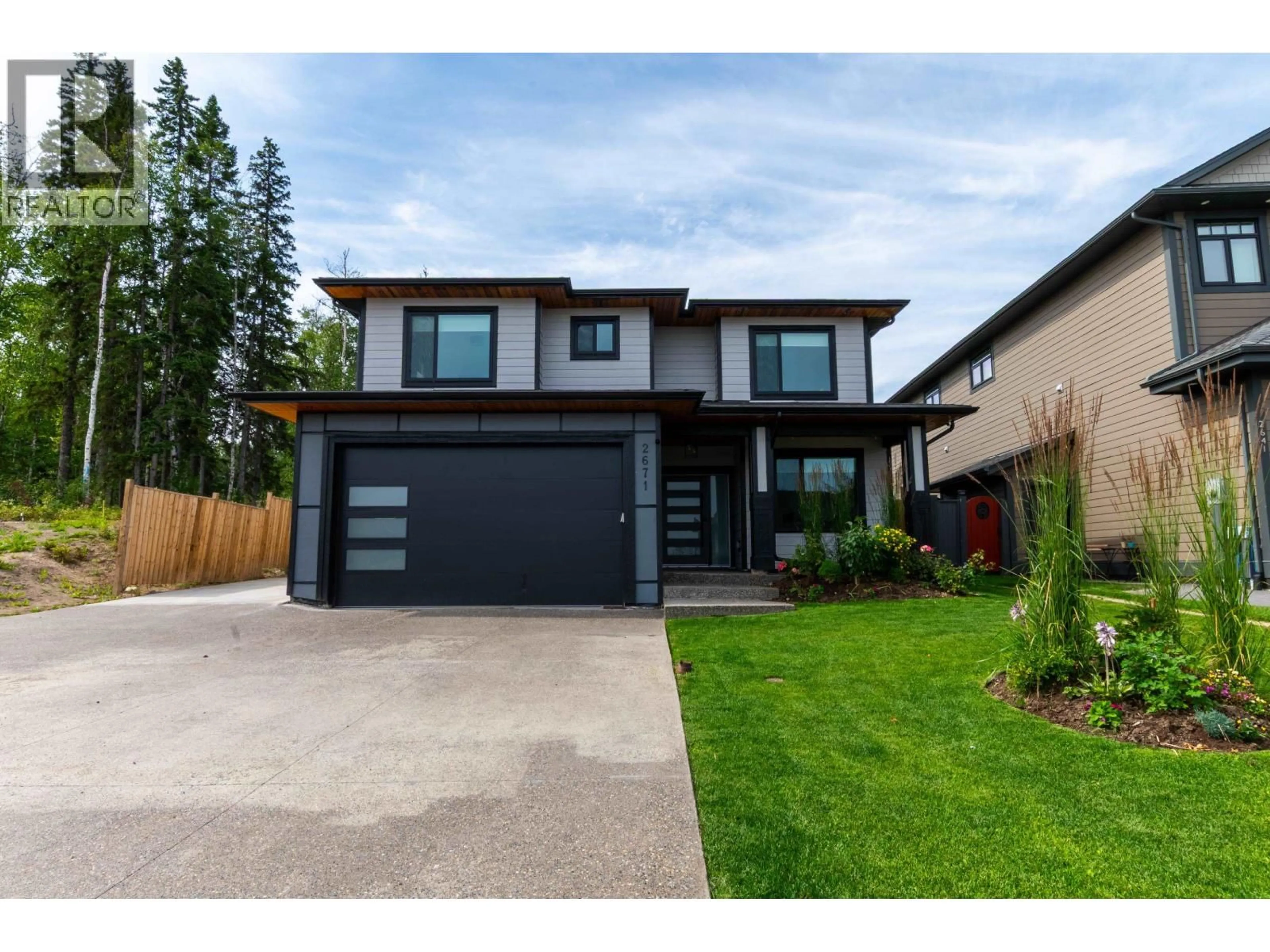 Home with brick exterior material, street for 2671 CHANCELLOR BOULEVARD, Prince George British Columbia V2N0E6