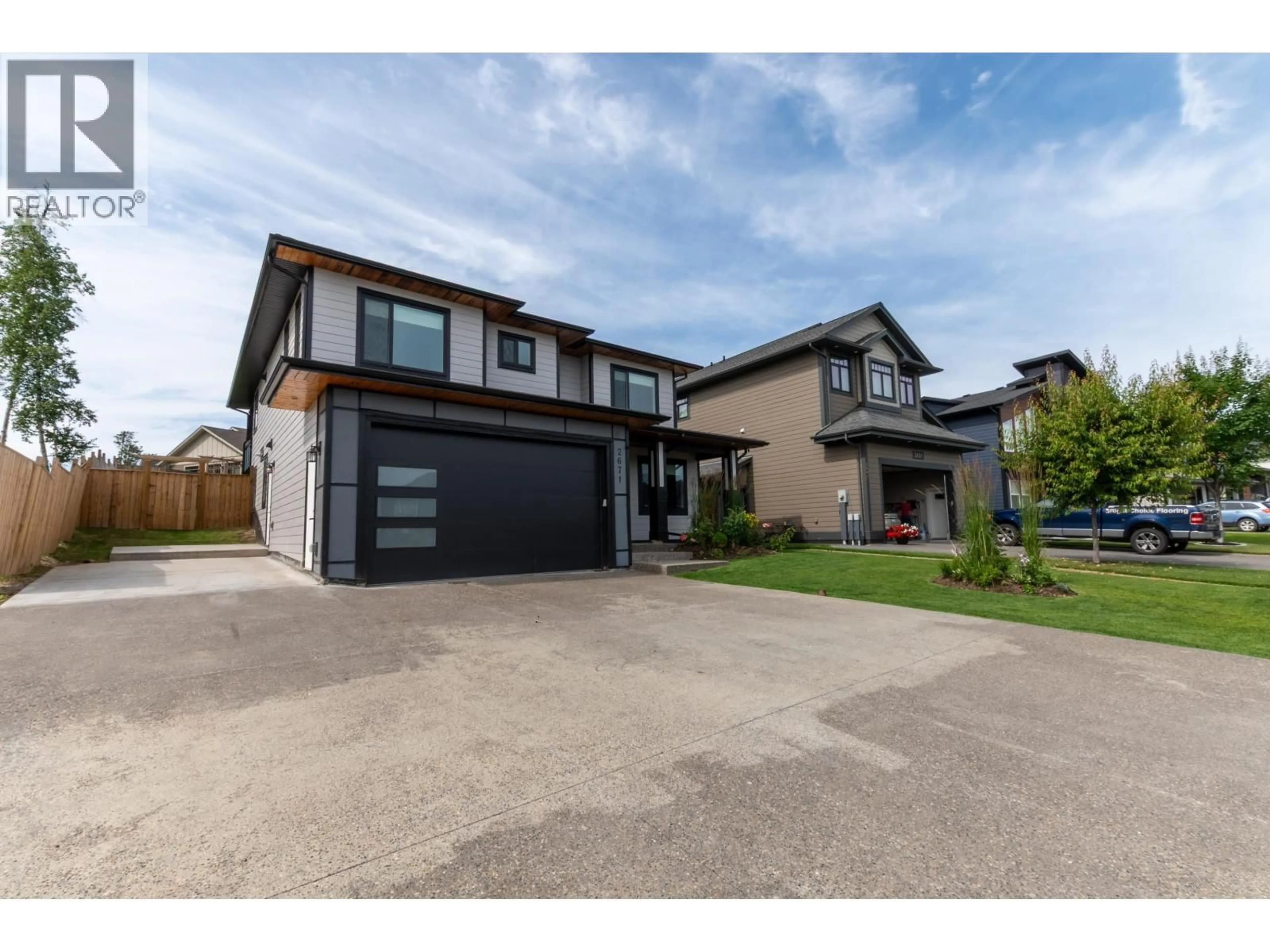Home with brick exterior material, street for 2671 CHANCELLOR BOULEVARD, Prince George British Columbia V2N0E6