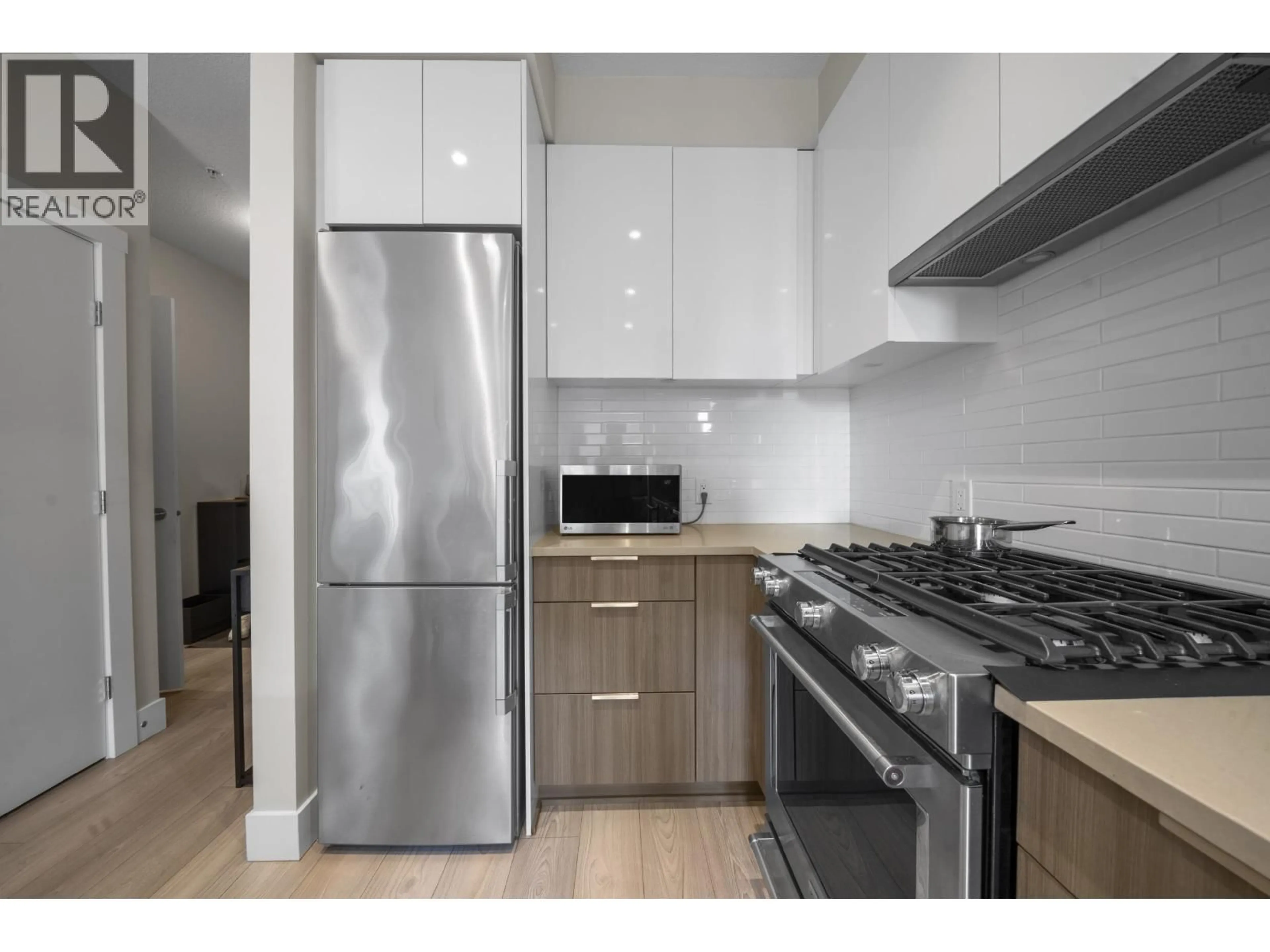 Standard kitchen, wood/laminate floor for 401 - 8508 RIVERGRASS DRIVE, Vancouver British Columbia V5S0H7