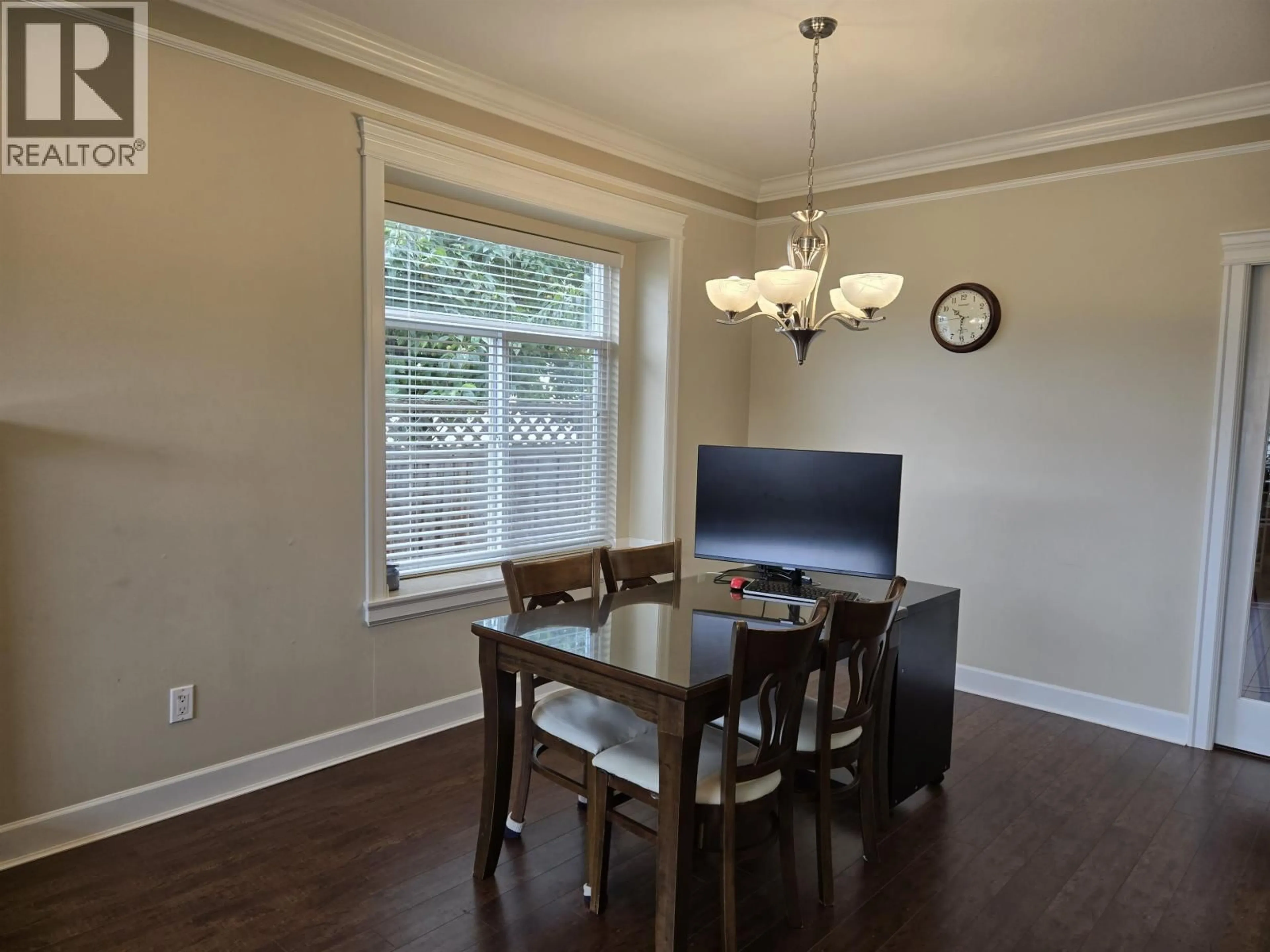 Dining room, wood/laminate floor for 6685 UNION STREET, Burnaby British Columbia V5B1X2