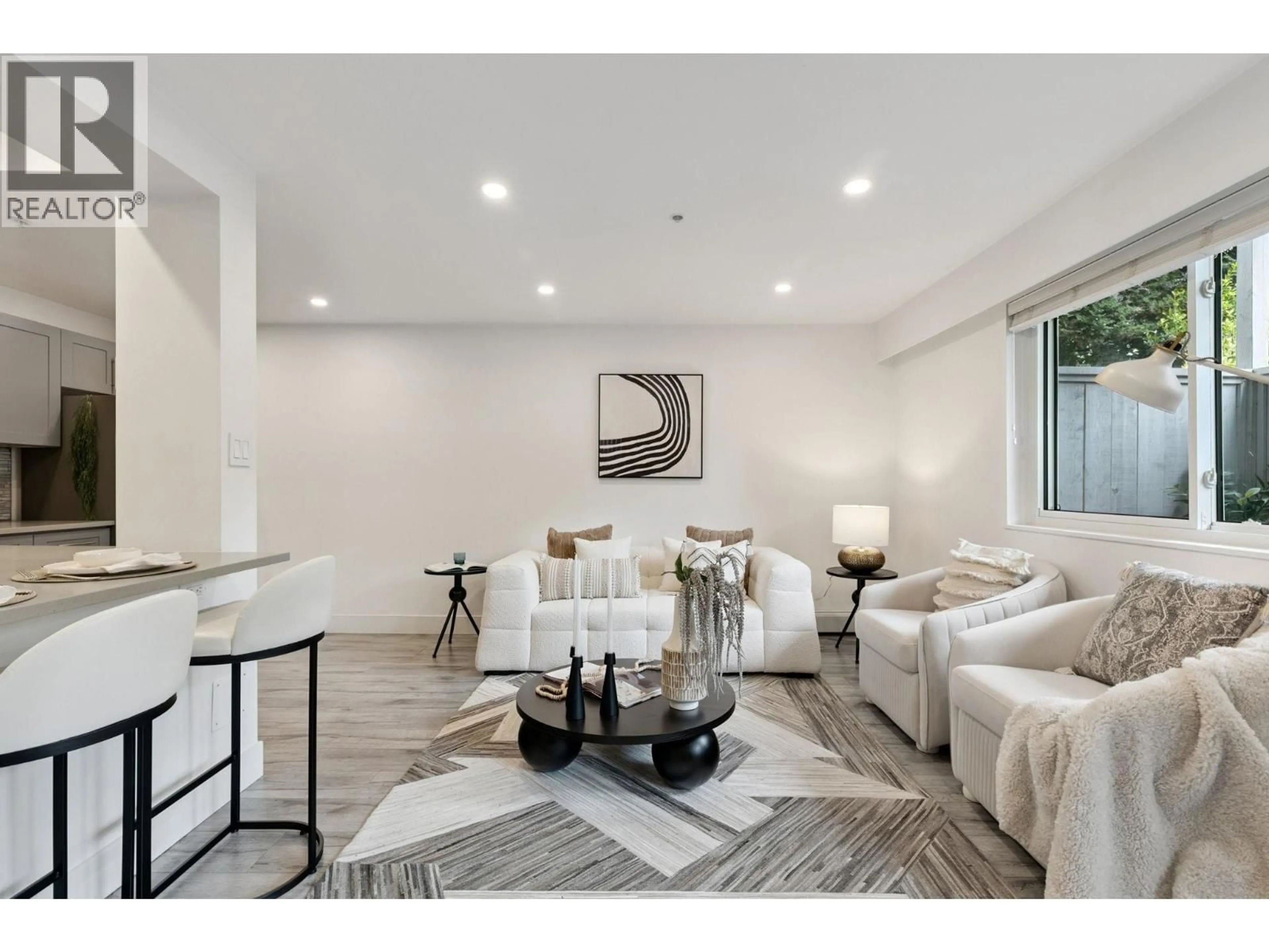 Living room with furniture, unknown for 101 - 2036 COQUITLAM AVENUE, Port Coquitlam British Columbia V3B1J5