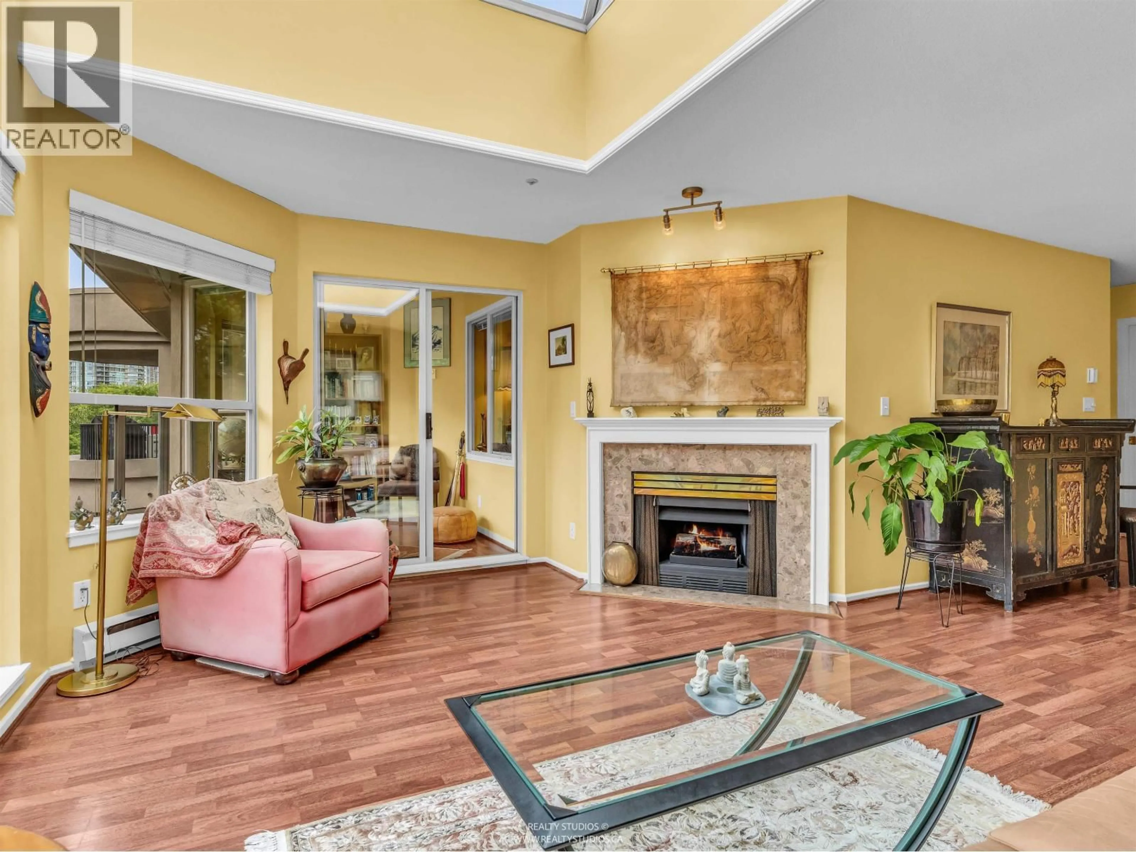 Living room with furniture, ceramic/tile floor for 401 - 525 WHEELHOUSE SQUARE, Vancouver British Columbia V5Z4L8