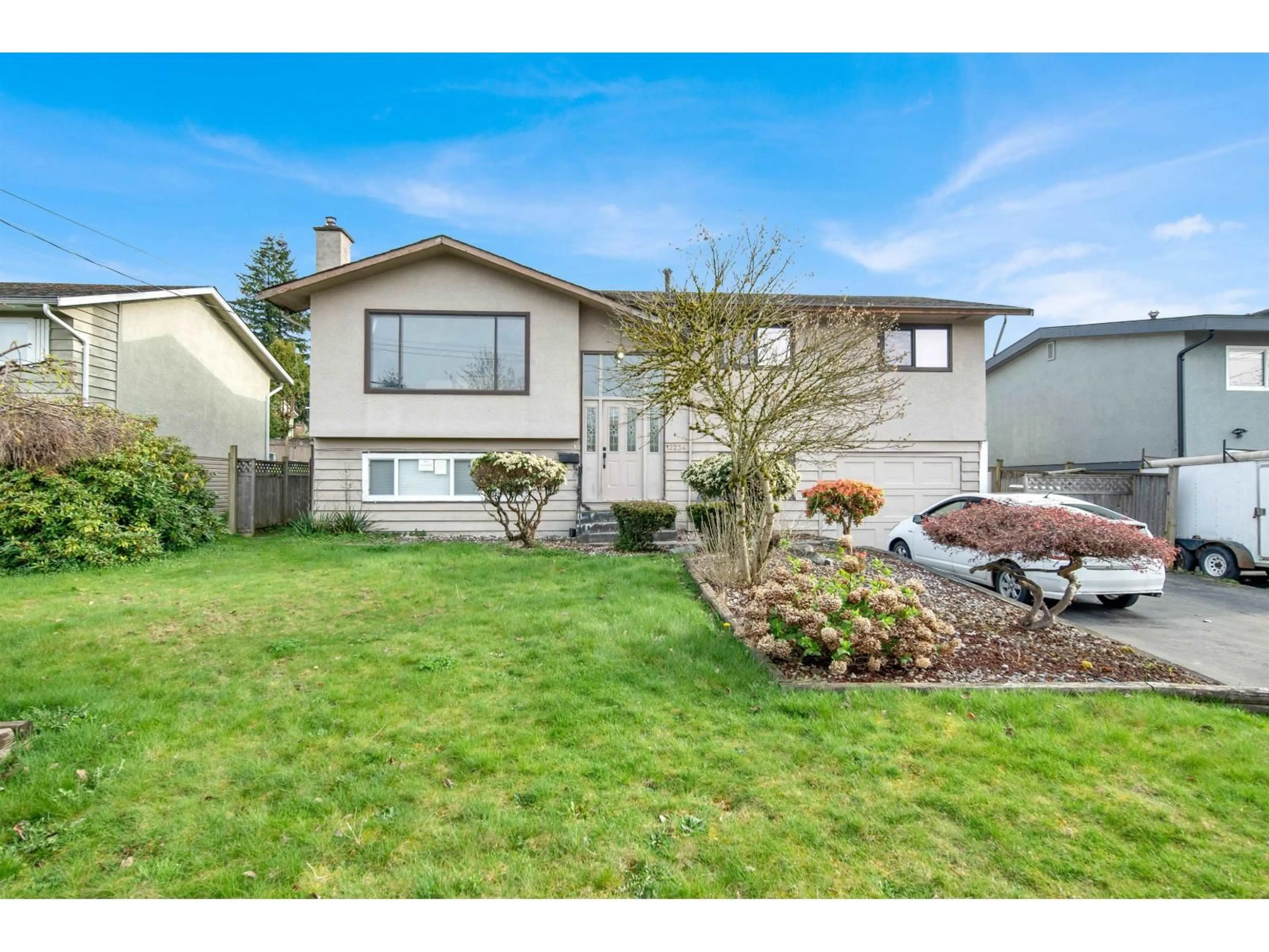 Home with vinyl exterior material, street for 12234 99A, Surrey British Columbia V3V2R2