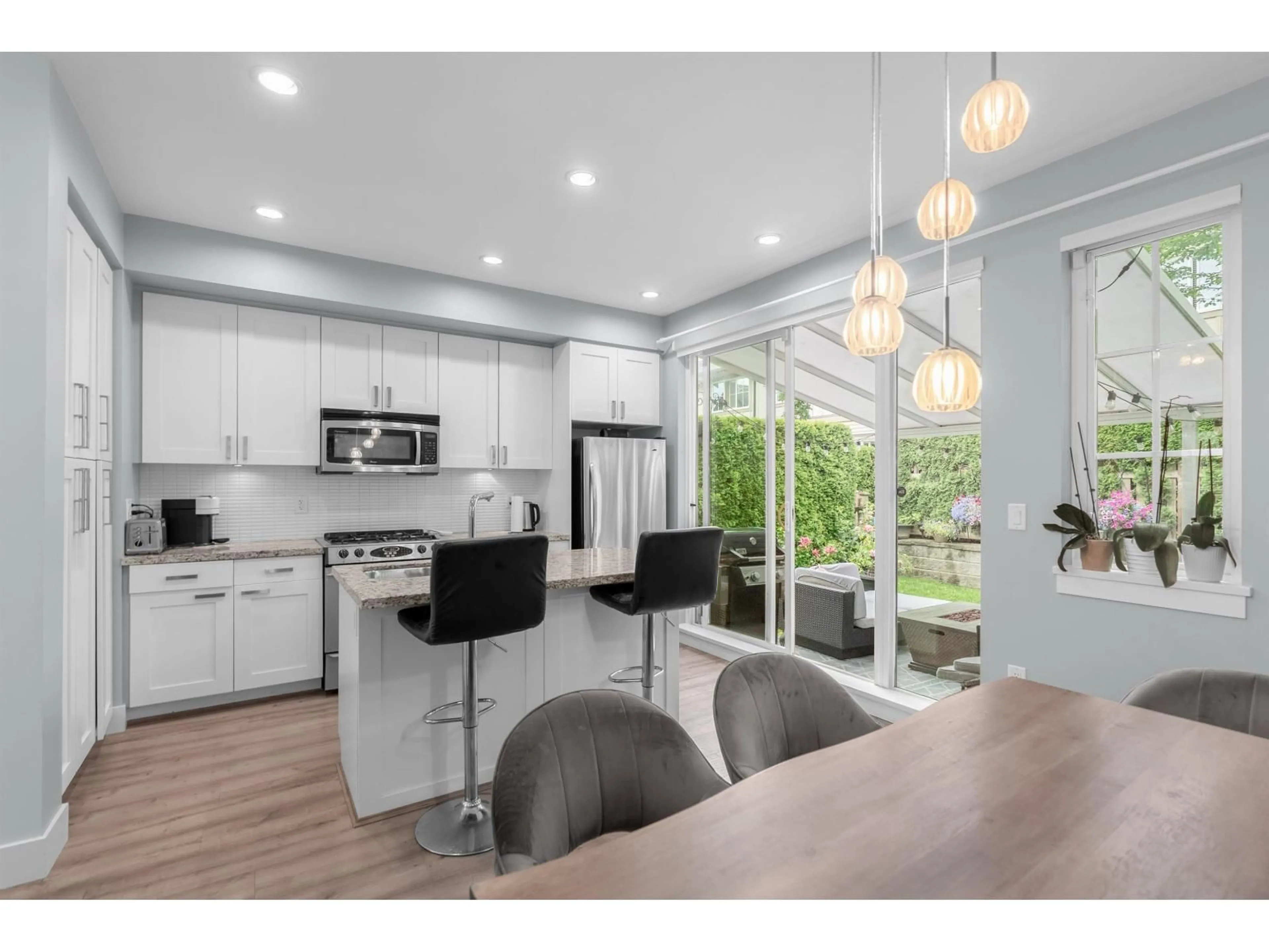 Open concept kitchen, wood/laminate floor for 114 - 2501 161A, Surrey British Columbia V3Z7Y6