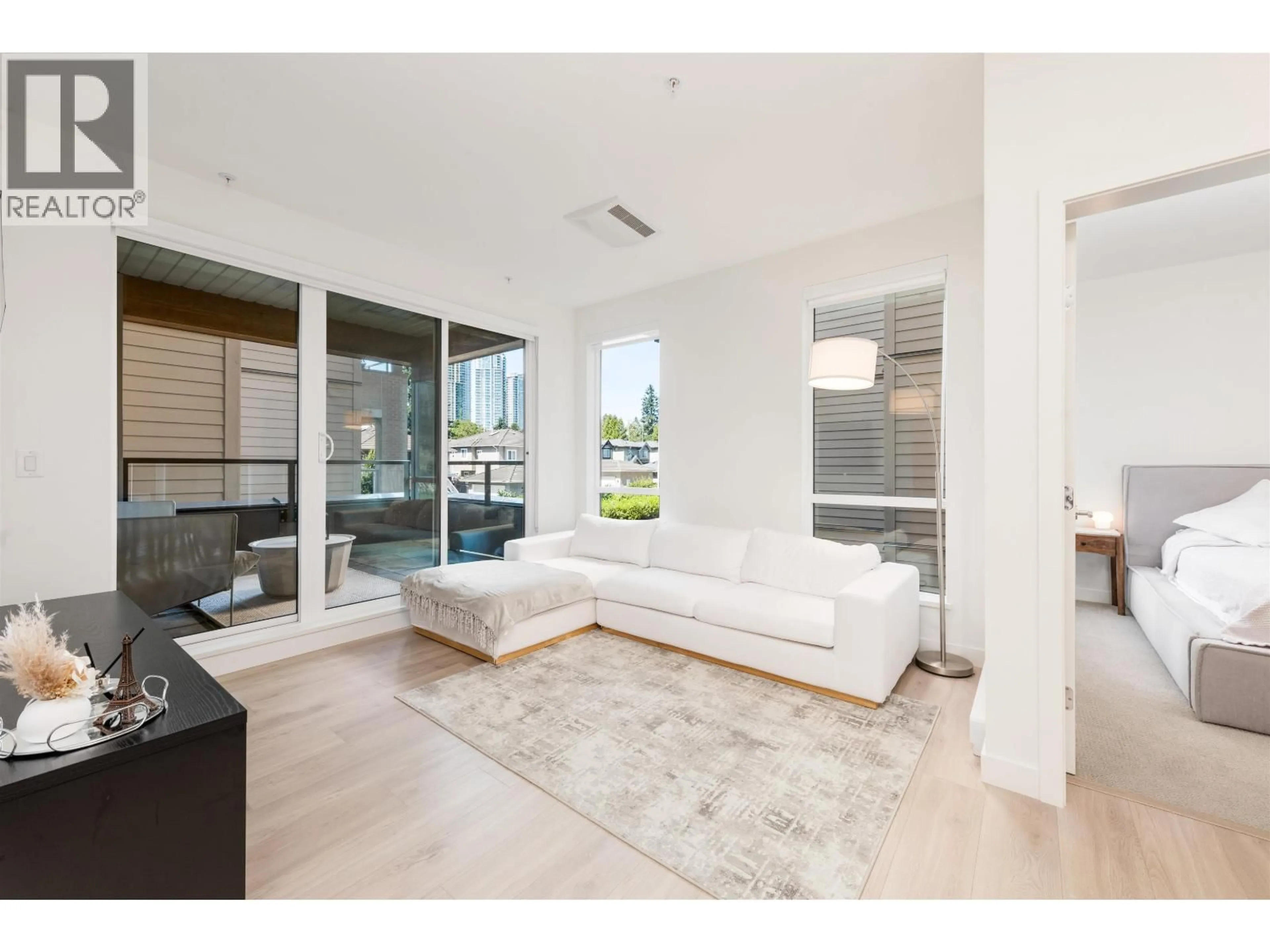 Living room with furniture, unknown for 222 - 7588 16TH STREET, Burnaby British Columbia V3N0H8