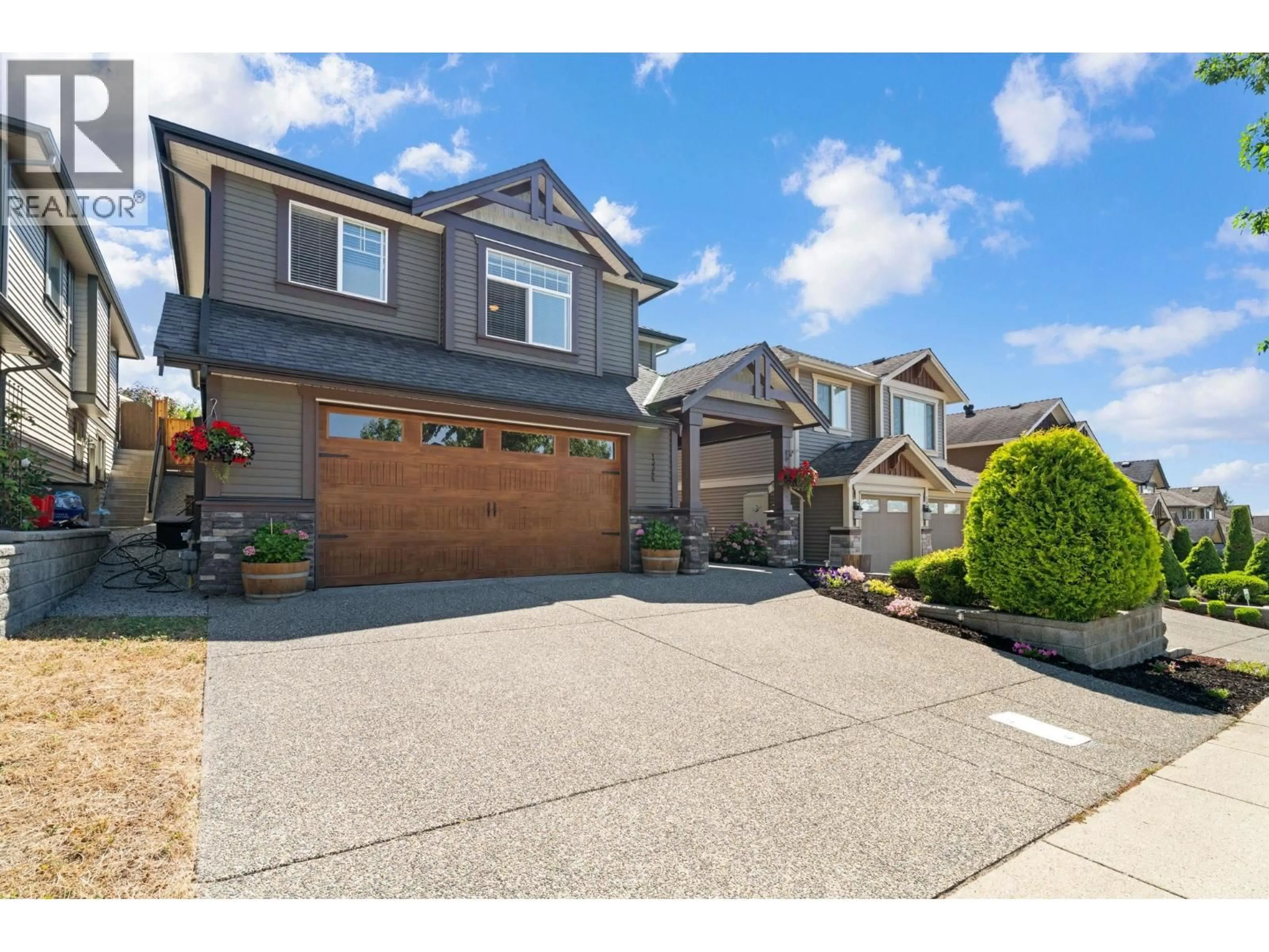 Home with vinyl exterior material, street for 13346 236 STREET, Maple Ridge British Columbia V4R0E4