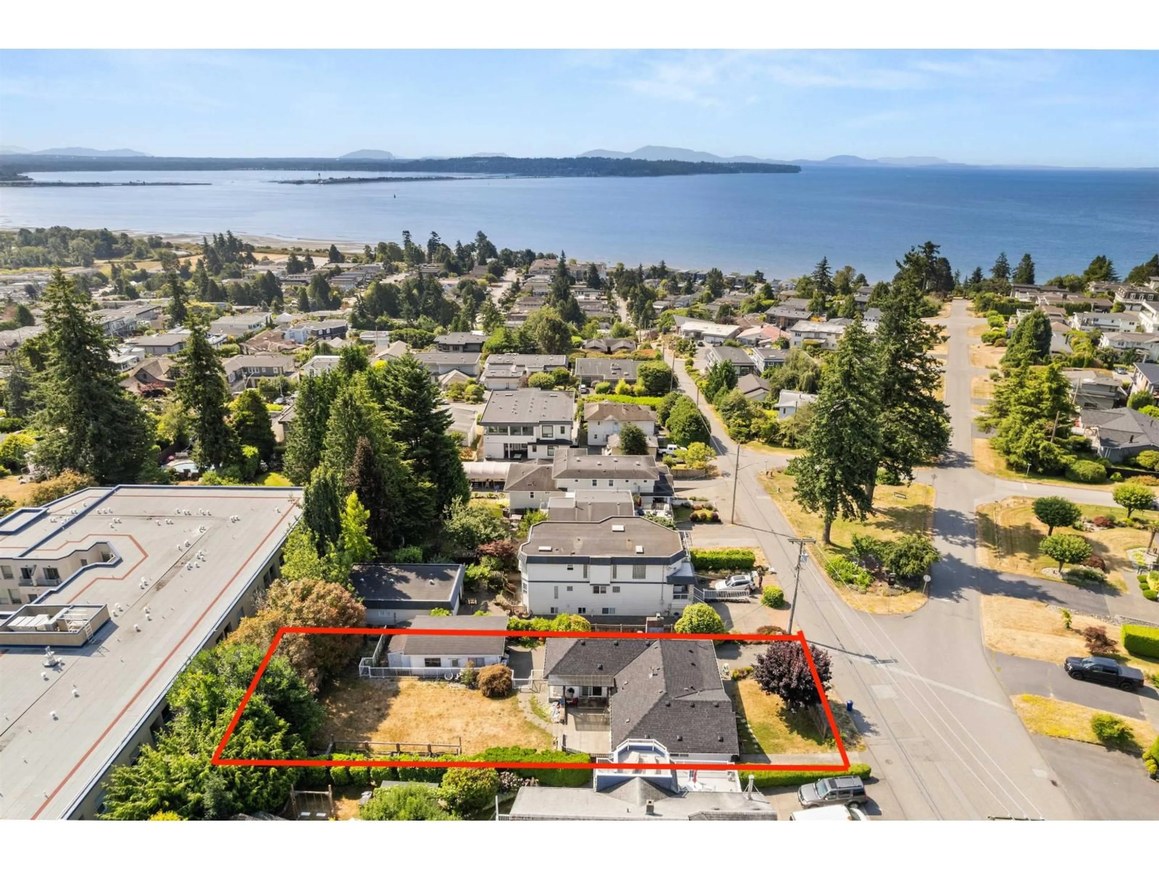 A pic from outside/outdoor area/front of a property/back of a property/a pic from drone, water/lake/river/ocean view for 1154 FINLAY, White Rock British Columbia V4B4K8