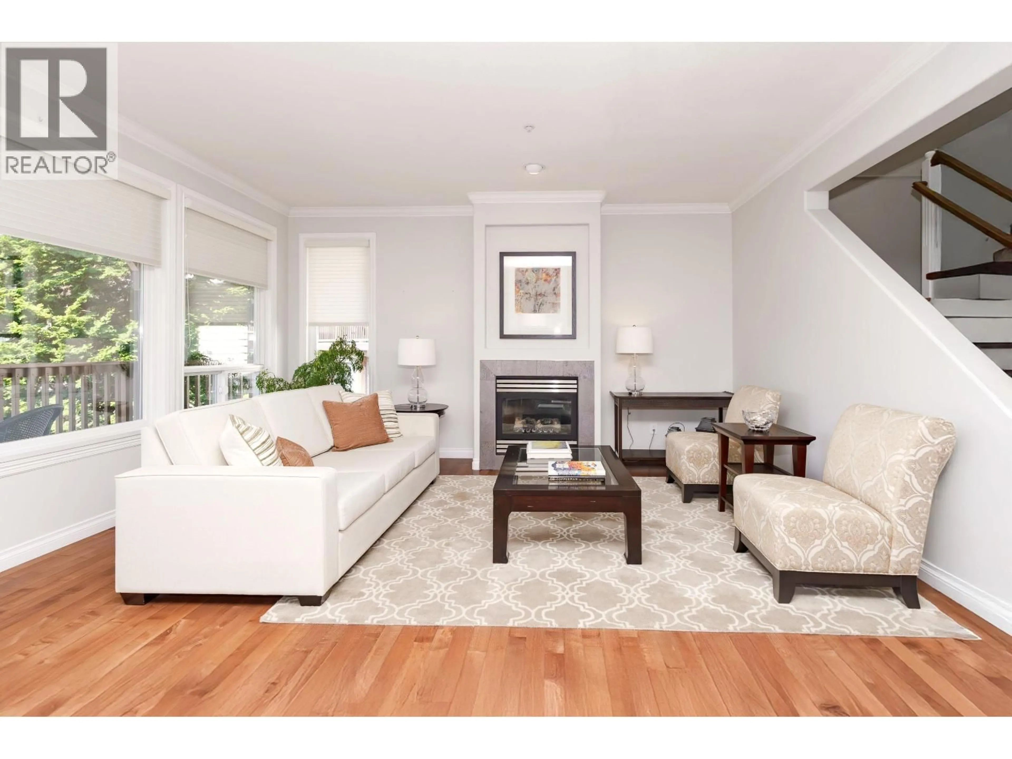 Living room with furniture, wood/laminate floor for 10 - 2287 ARGUE STREET, Port Coquitlam British Columbia V3C6R2