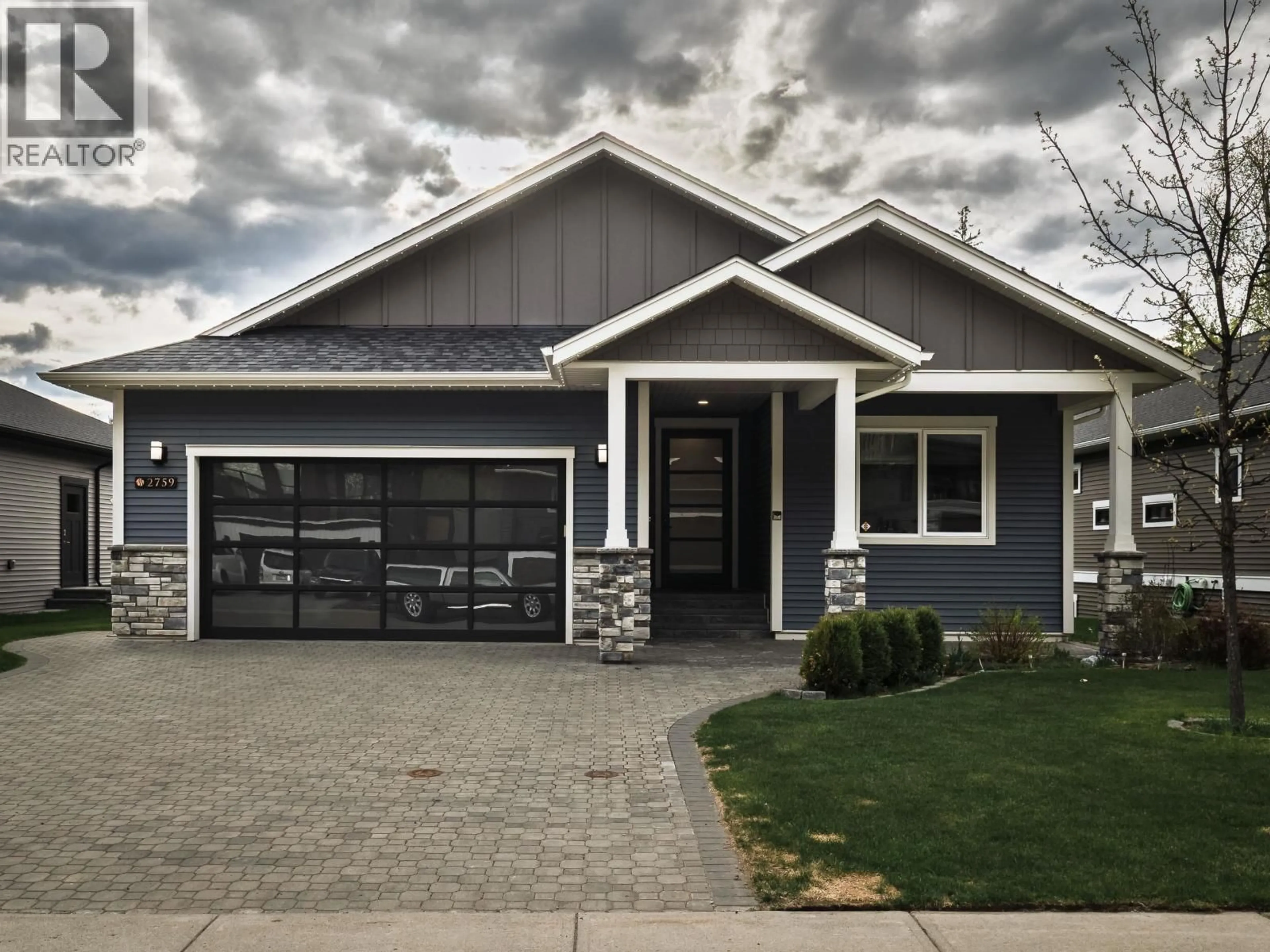 Home with vinyl exterior material, street for 2759 LINKS DRIVE, Prince George British Columbia V2K0B3