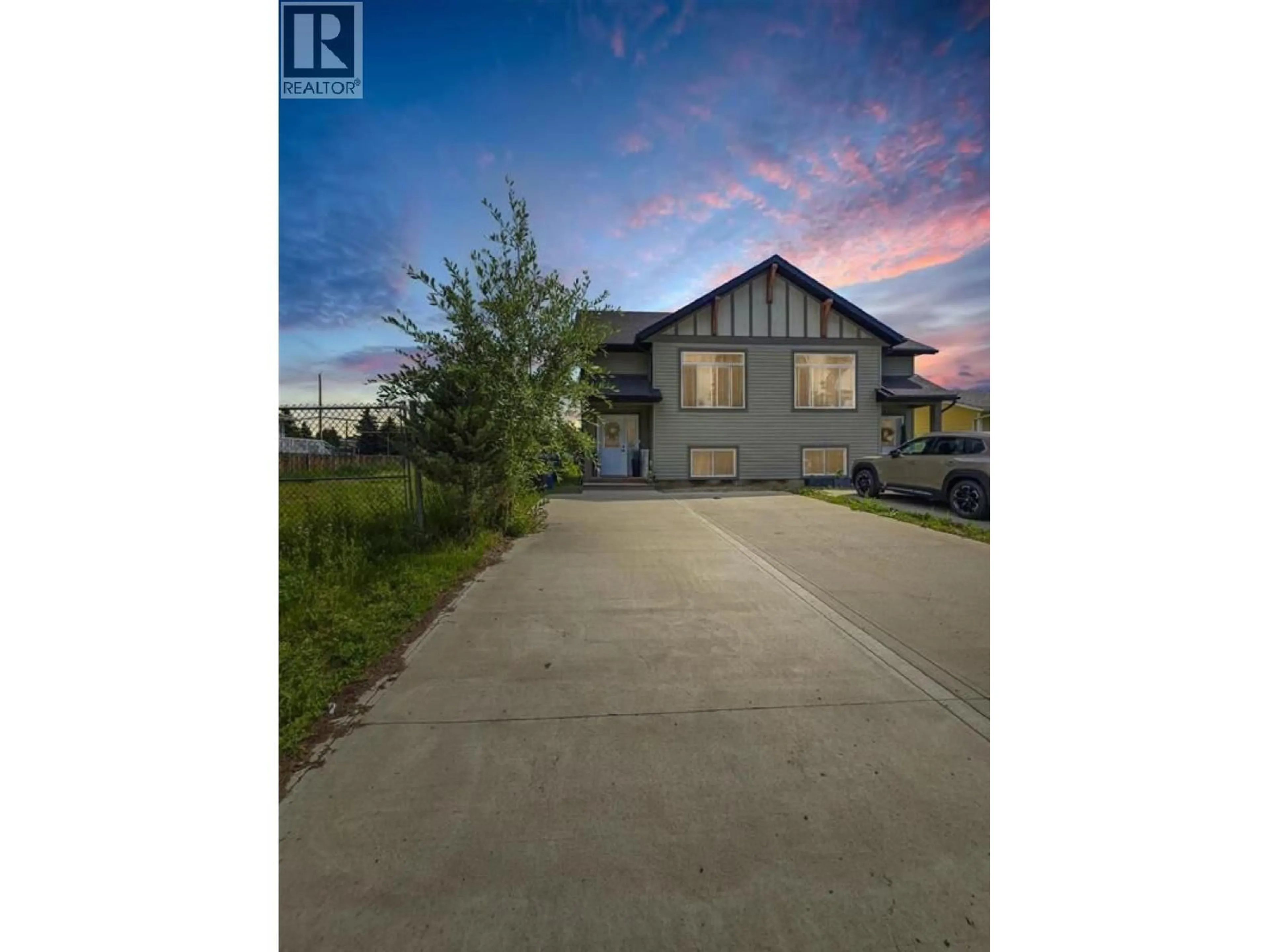 A pic from outside/outdoor area/front of a property/back of a property/a pic from drone, street for 8817 90 STREET, Fort St. John British Columbia V1J4K3