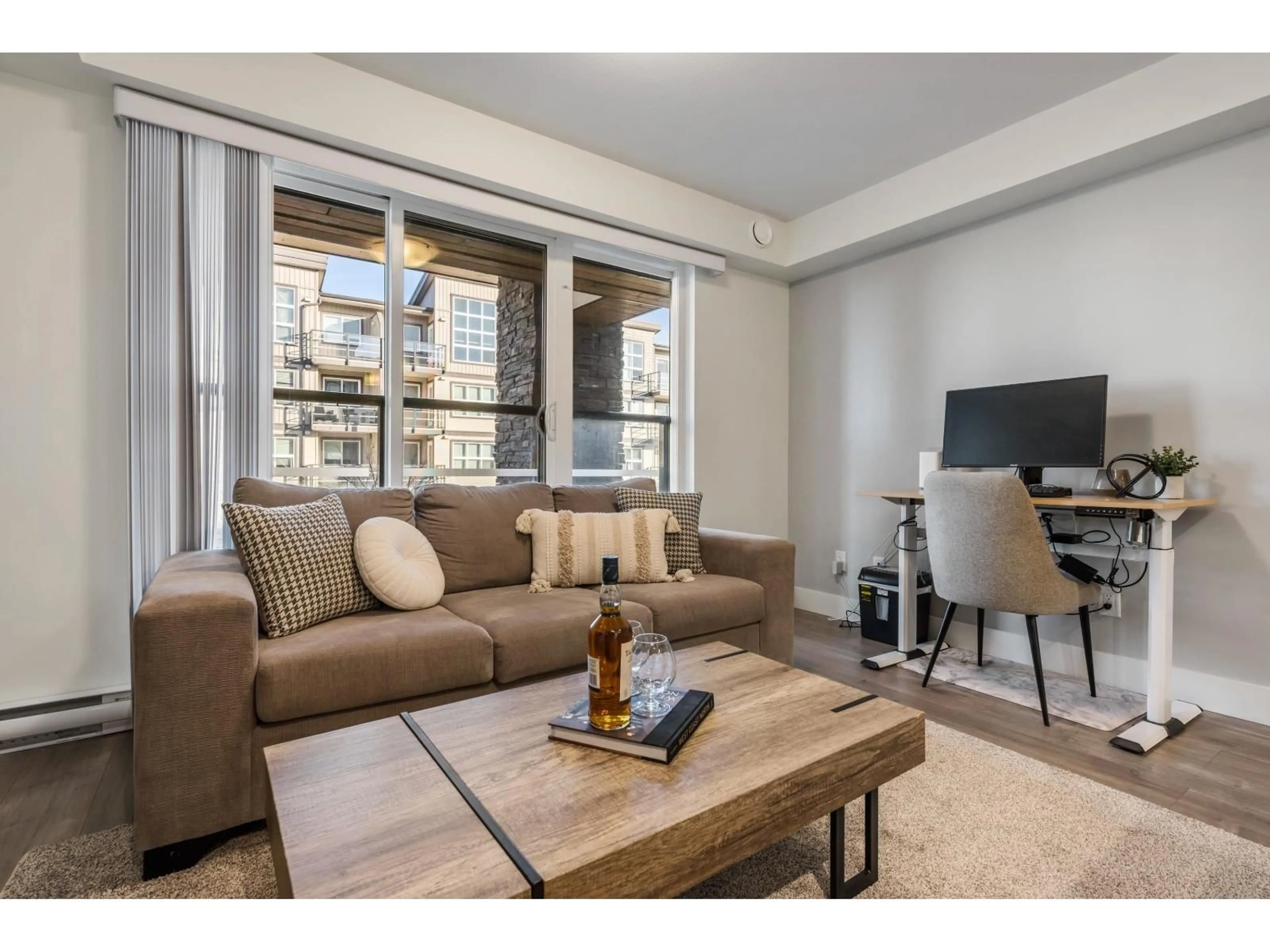 Living room with furniture, wood/laminate floor for 222 - 30515 CARDINAL, Abbotsford British Columbia V2T0A8
