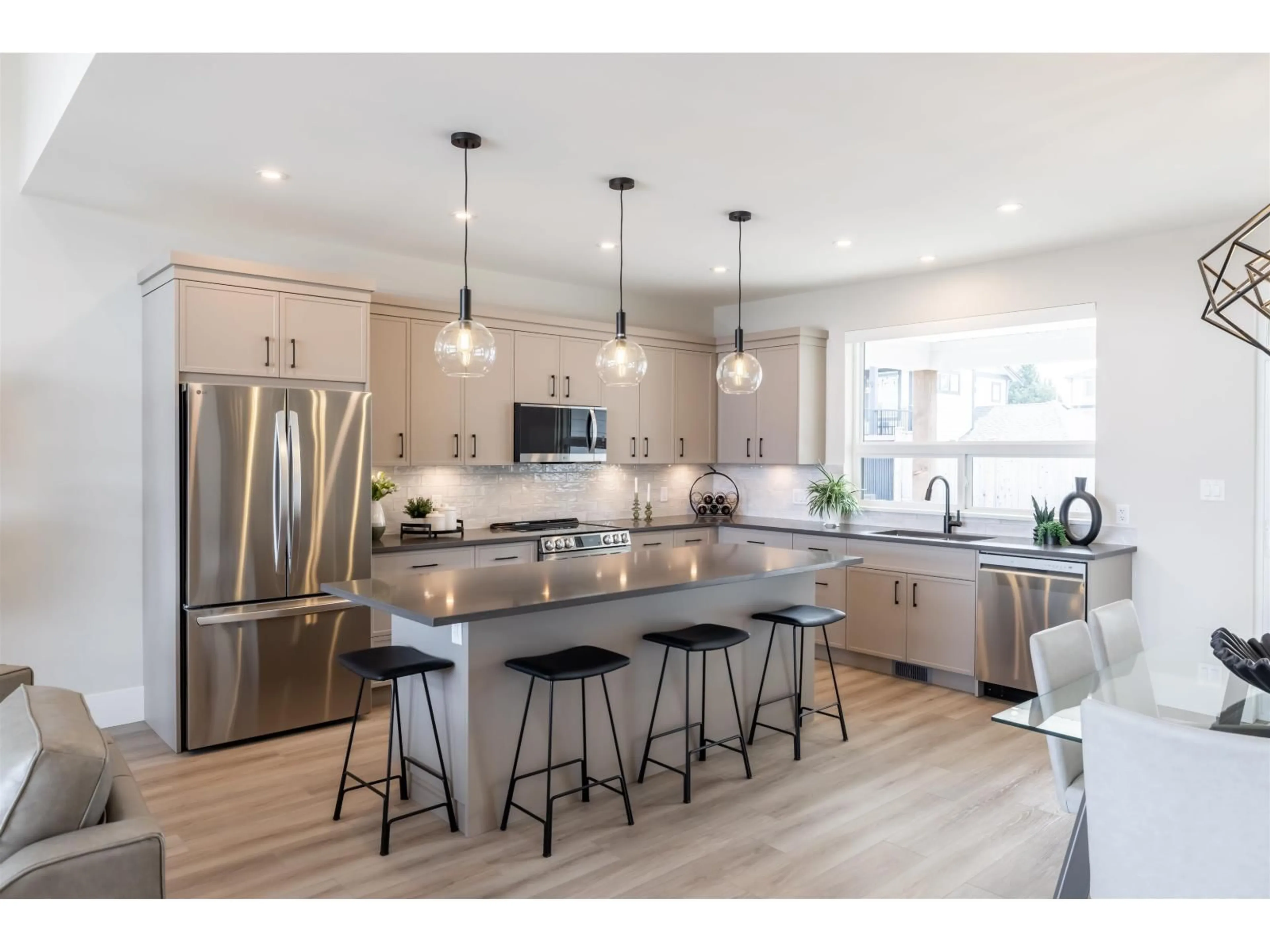 Open concept kitchen, wood/laminate floor for 47280 VALERIE PLACE, Chilliwack British Columbia V2P7W9