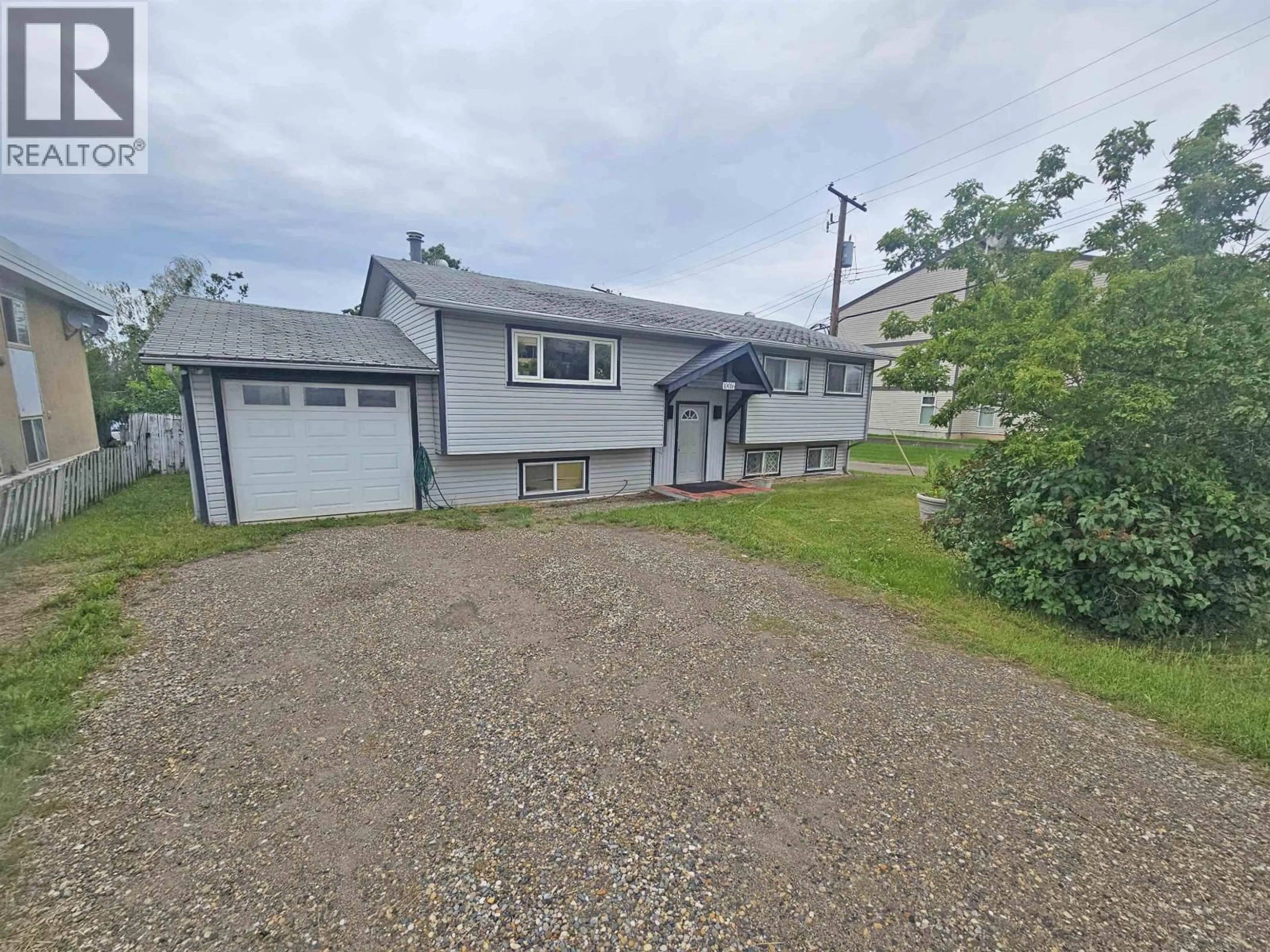 A pic from outside/outdoor area/front of a property/back of a property/a pic from drone, unknown for 10016 110 AVENUE, Fort St. John British Columbia V1J2T2