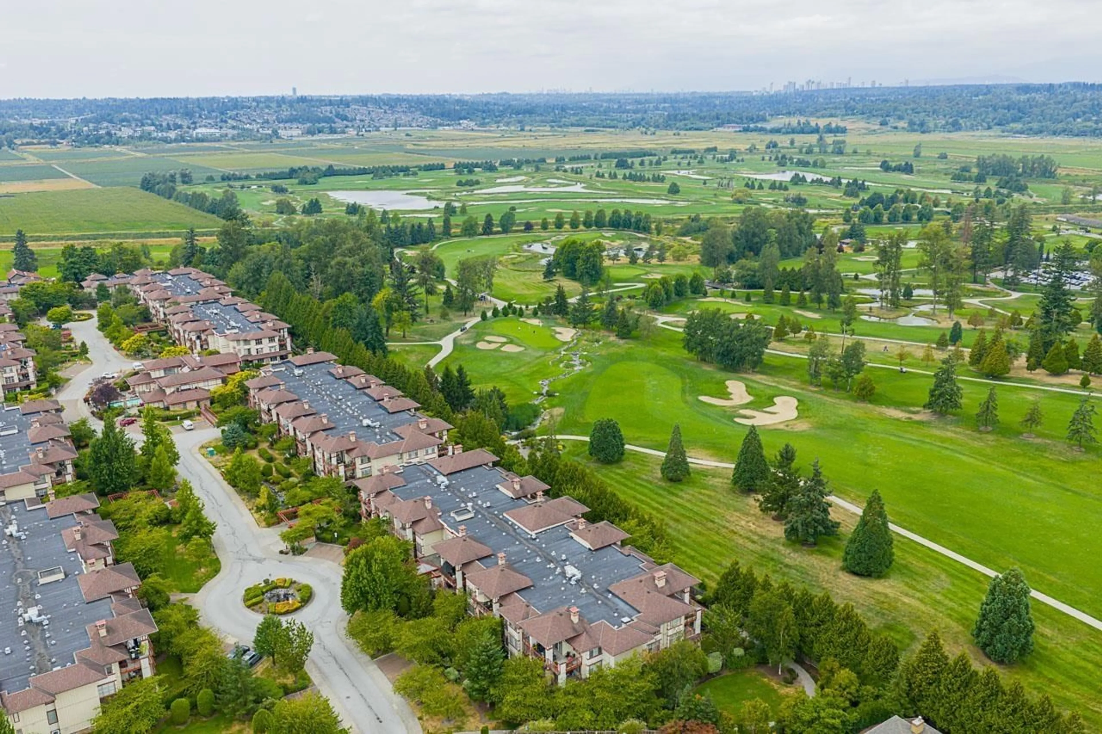 A pic from outside/outdoor area/front of a property/back of a property/a pic from drone, unknown for 308 - 16499 64, Surrey British Columbia V3S6V7