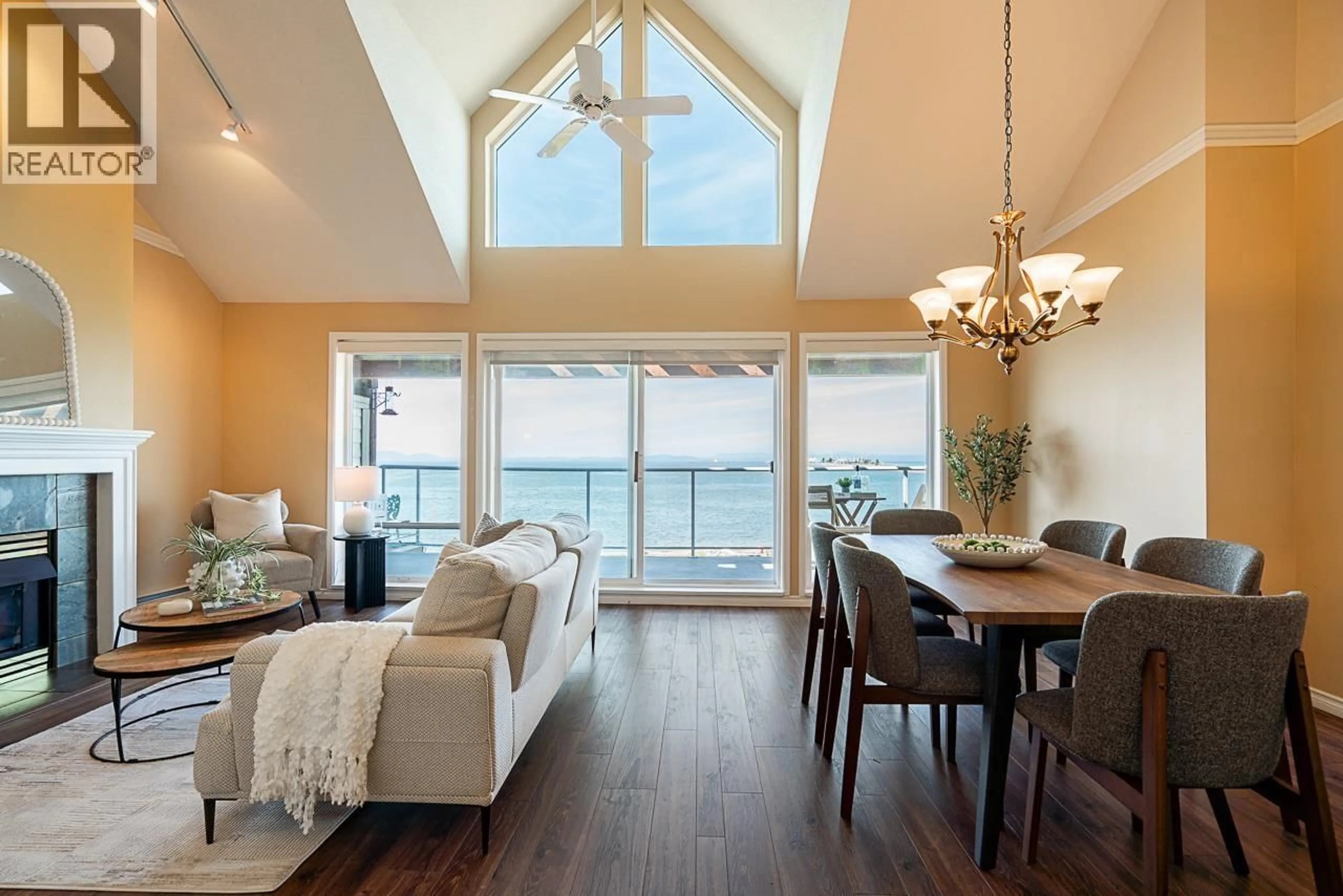 Living room with furniture, wood/laminate floor for 407 - 1120 TSATSU SHORES DRIVE, Delta British Columbia V4M4G3