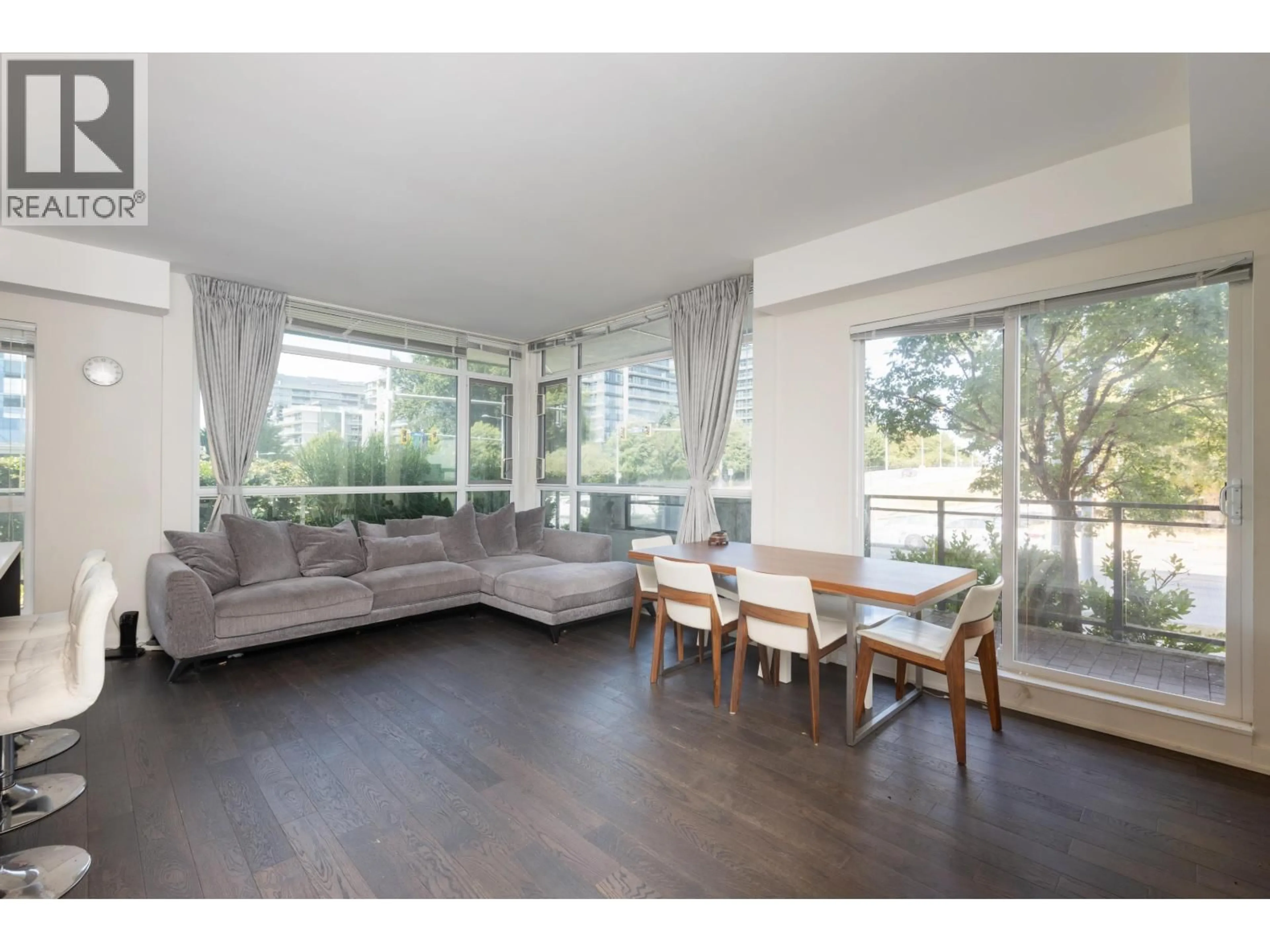 Living room with furniture, wood/laminate floor for 126 - 5311 CEDARBRIDGE WAY, Richmond British Columbia V6X0M3