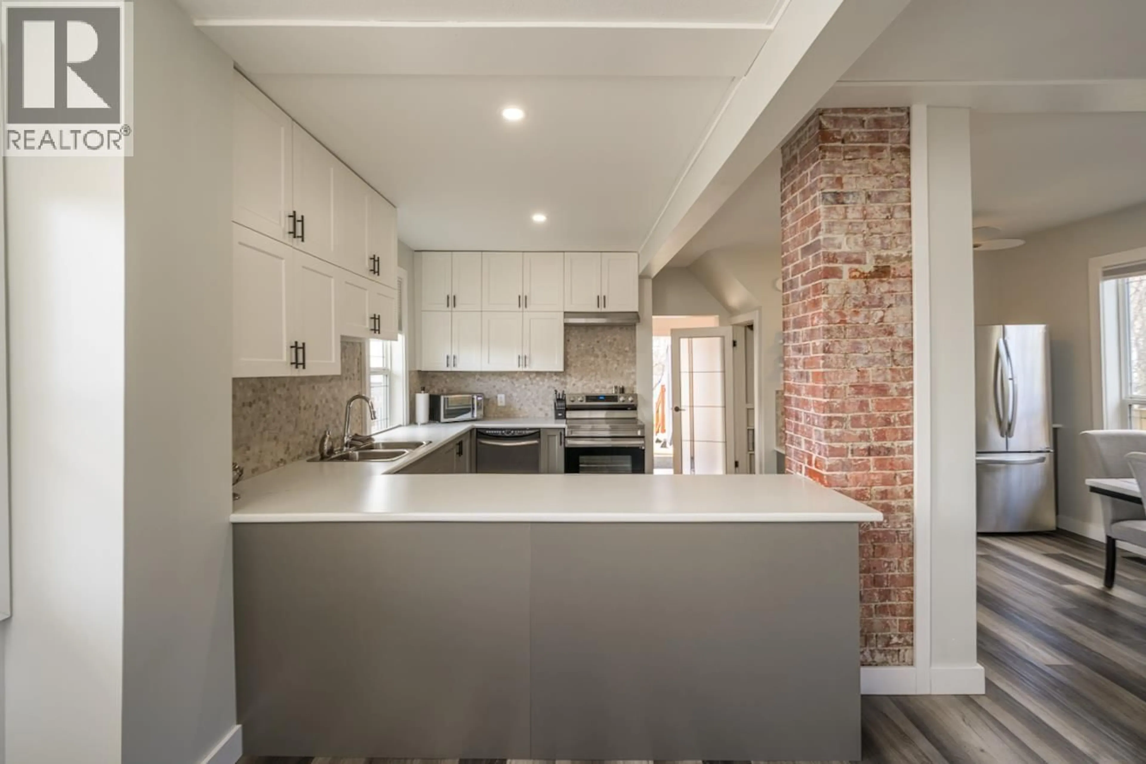 Contemporary kitchen, ceramic/tile floor for 1675 5TH AVENUE, Prince George British Columbia V2L3M2