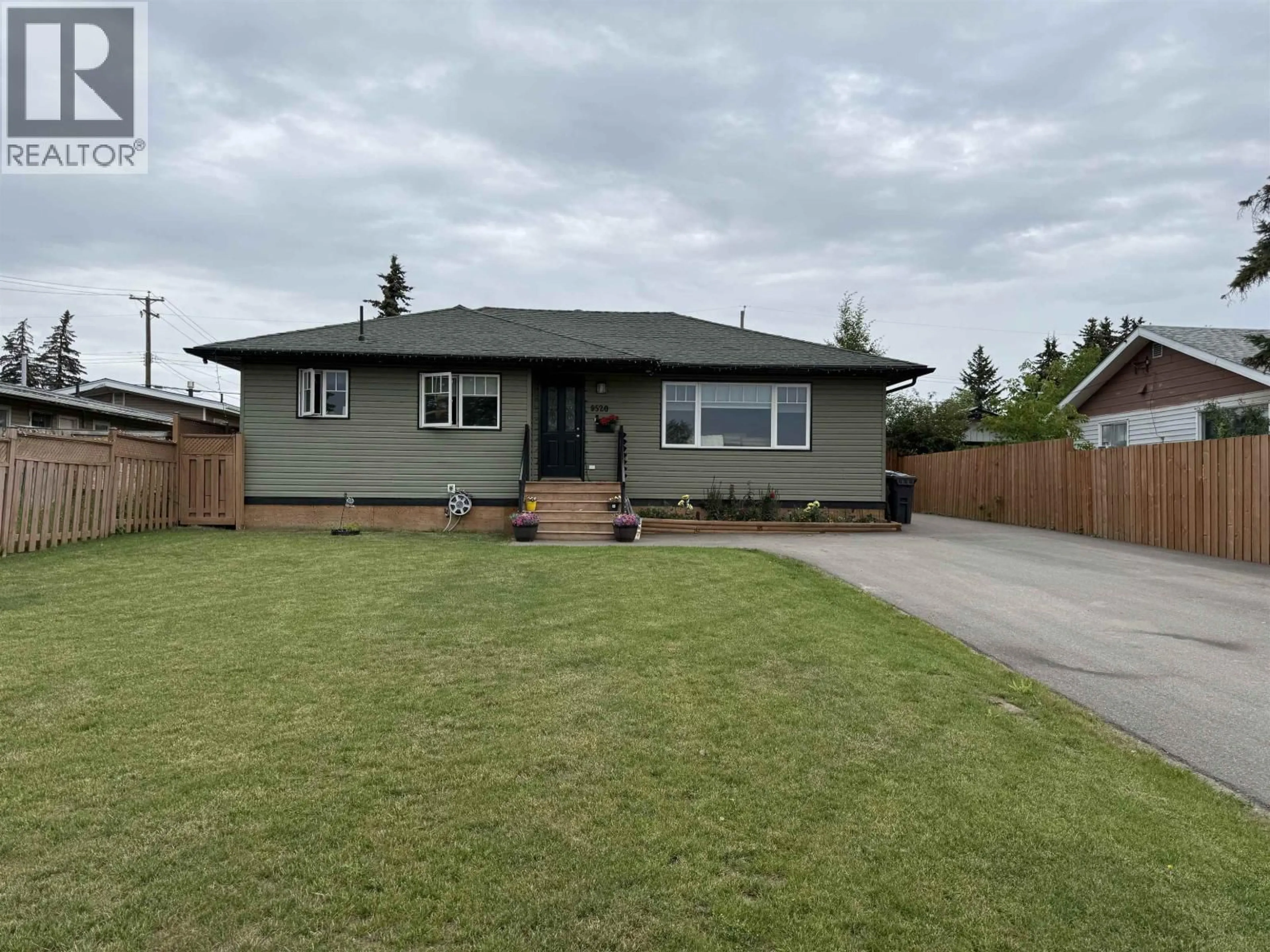 Home with vinyl exterior material, street for 9520 96 AVENUE, Fort St. John British Columbia V1J1K7