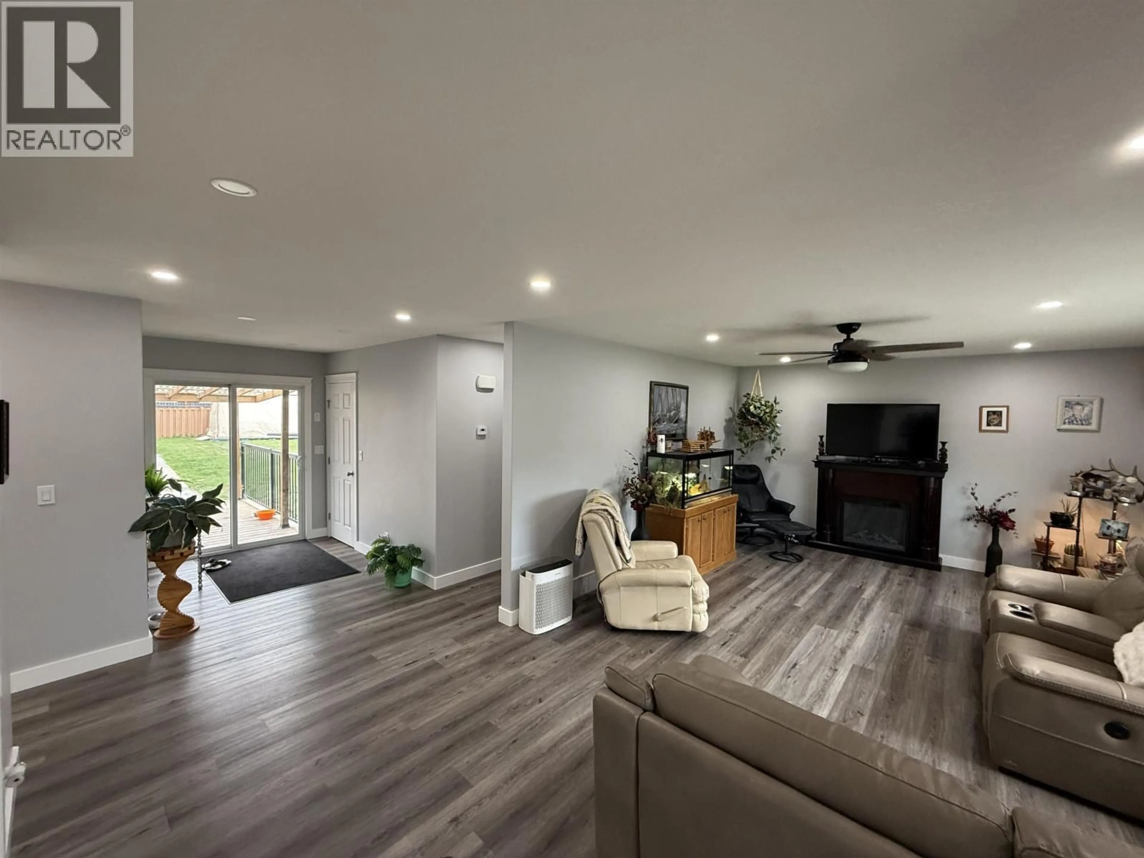 Living room with furniture, unknown for 9520 96 AVENUE, Fort St. John British Columbia V1J1K7