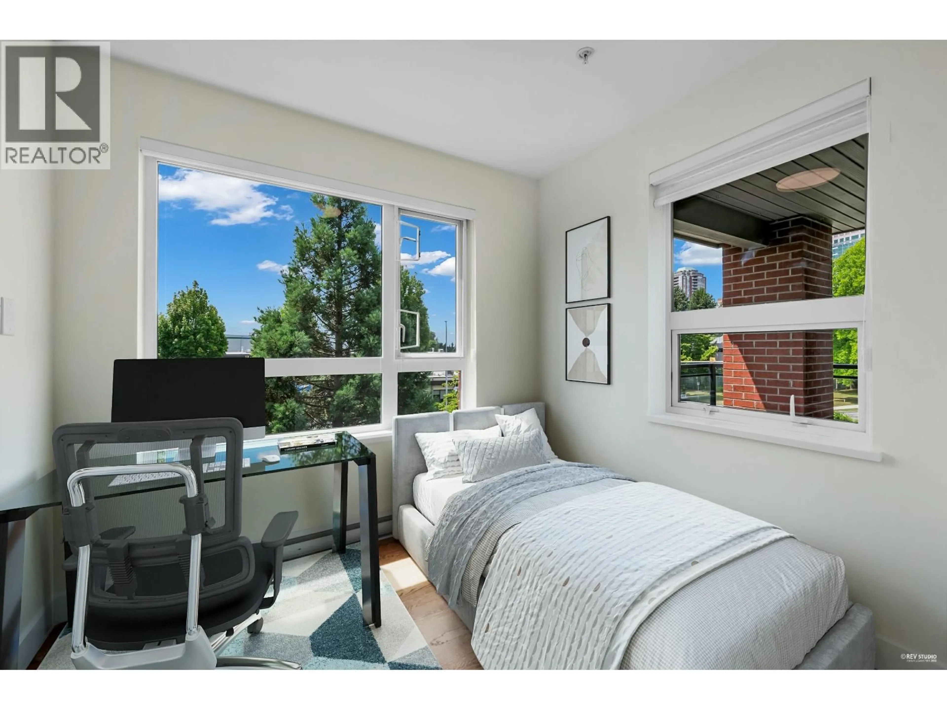 Bedroom with bed, unknown for 212 - 7058 14TH AVENUE, Burnaby British Columbia V3N0E6
