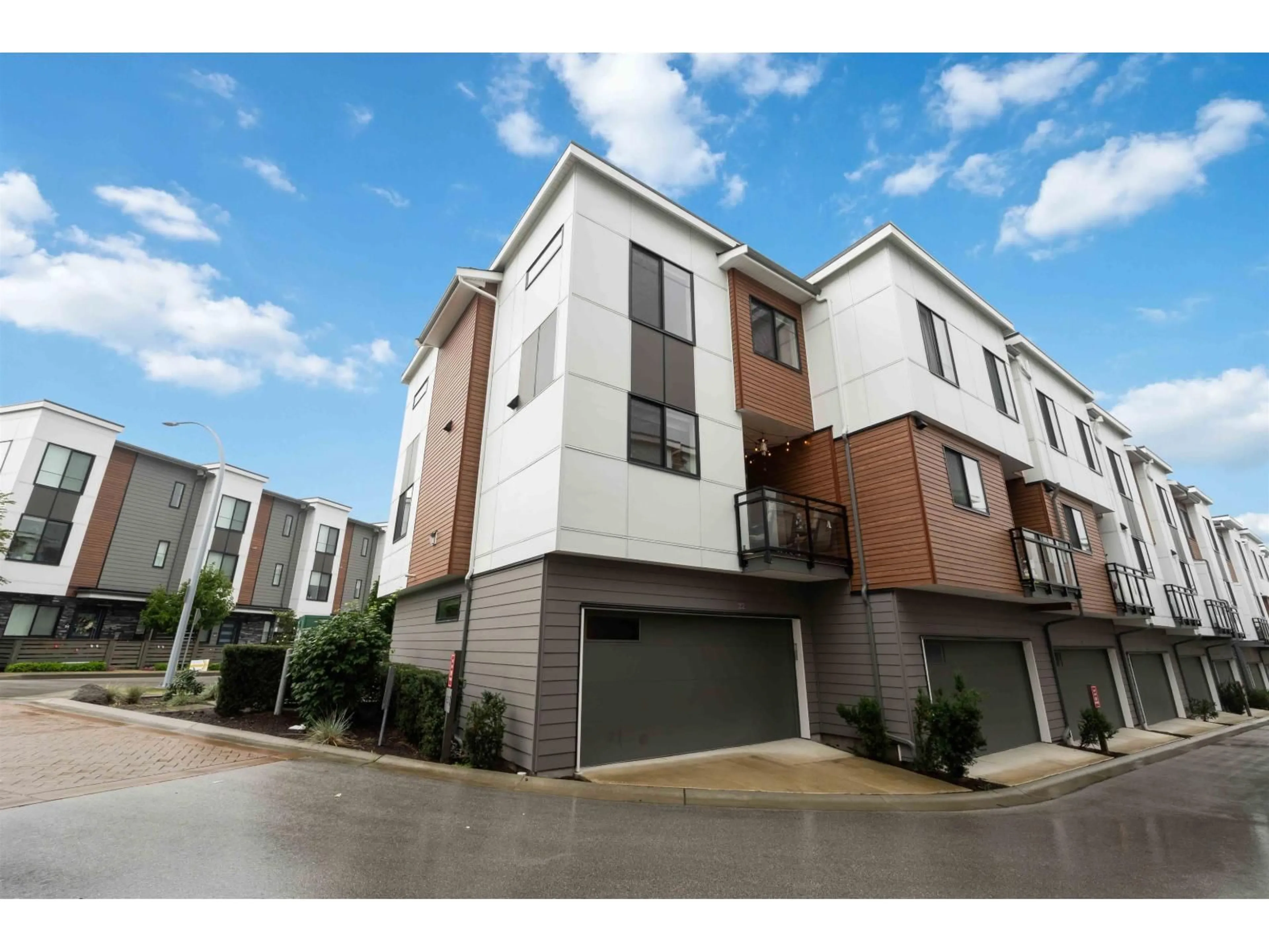 A pic from outside/outdoor area/front of a property/back of a property/a pic from drone, street for 22 - 1639 162 STREET, Surrey British Columbia V4A4Y1