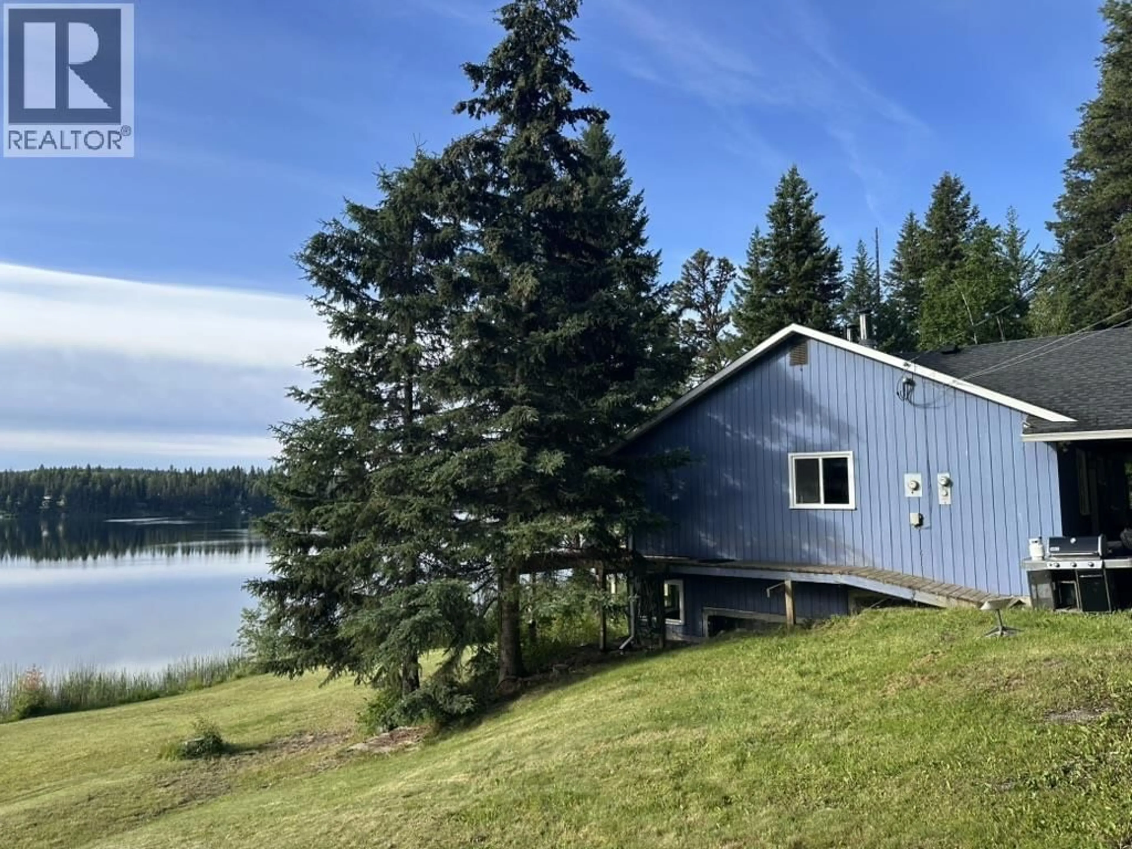 A pic from outside/outdoor area/front of a property/back of a property/a pic from drone, water/lake/river/ocean view for 2496 BIG LAKE-TYEE LAKE ROAD, Williams Lake British Columbia V2G4Y9