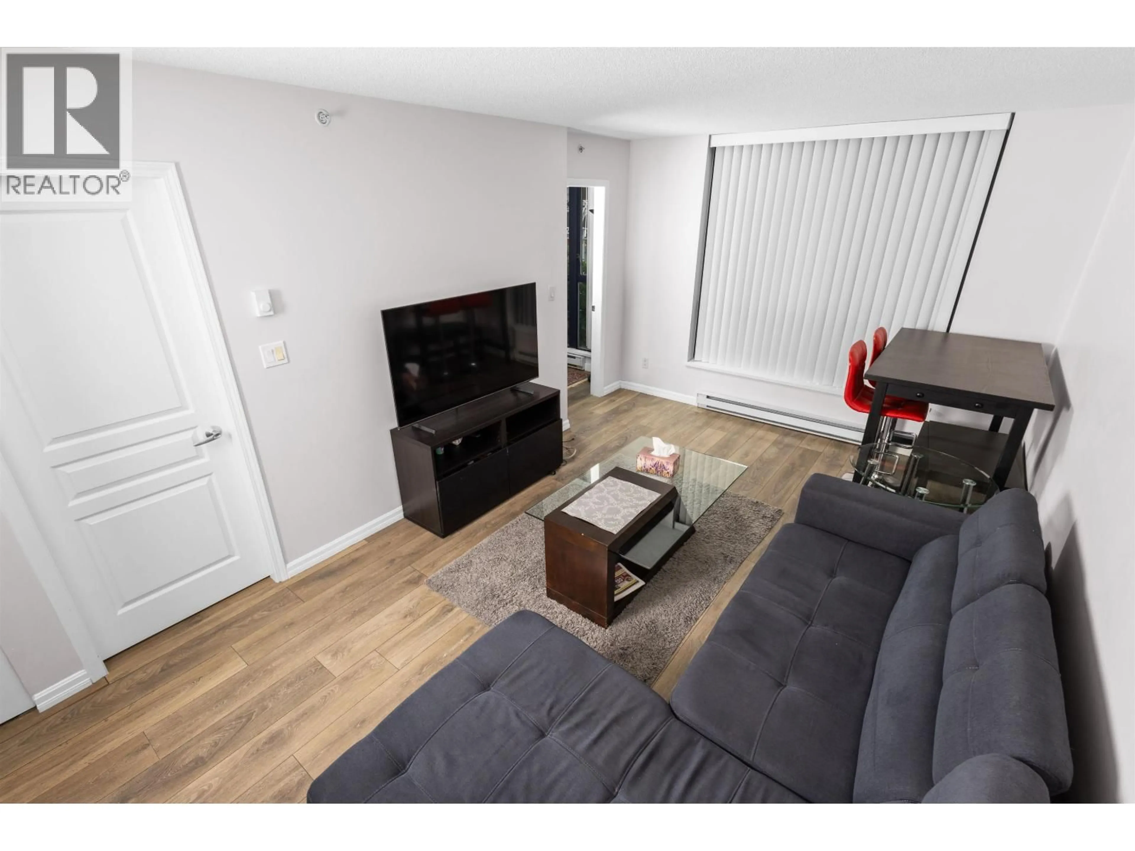 Living room with furniture, unknown for 502 - 3438 VANNESS AVENUE, Vancouver British Columbia V5R6E7