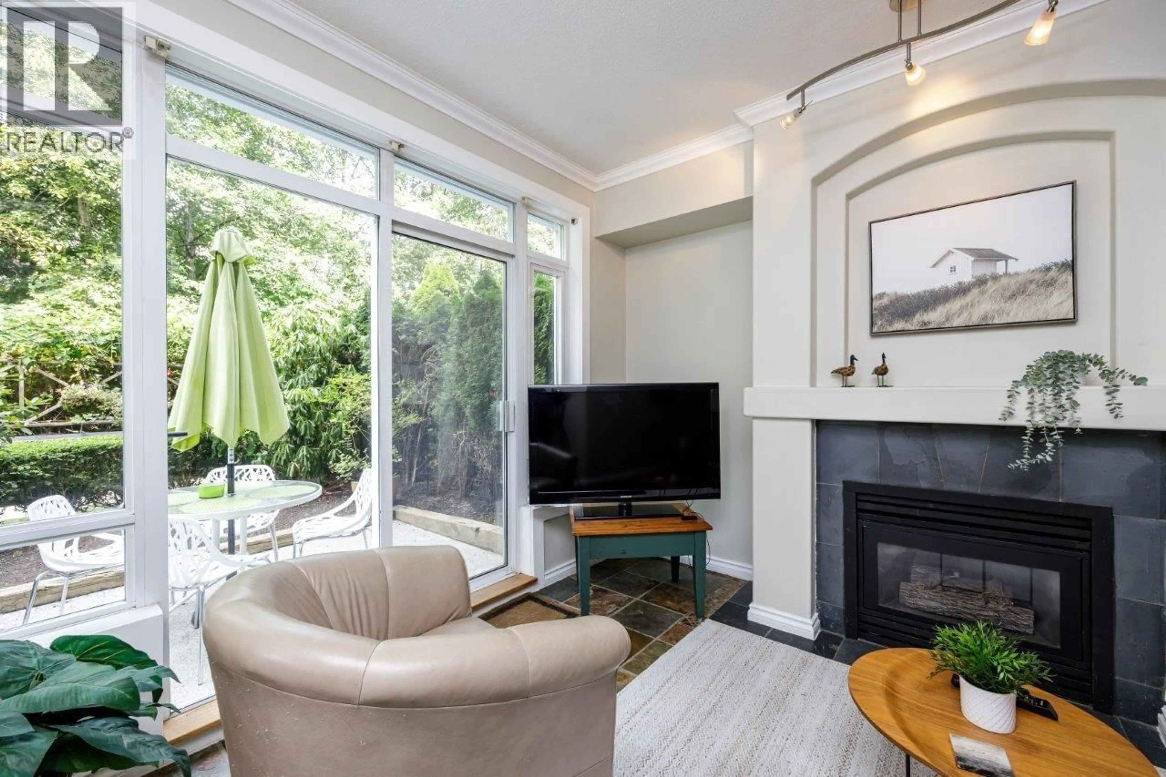 Living room with furniture, unknown for 211 - 3600 WINDCREST DRIVE, North Vancouver British Columbia V7G2S5