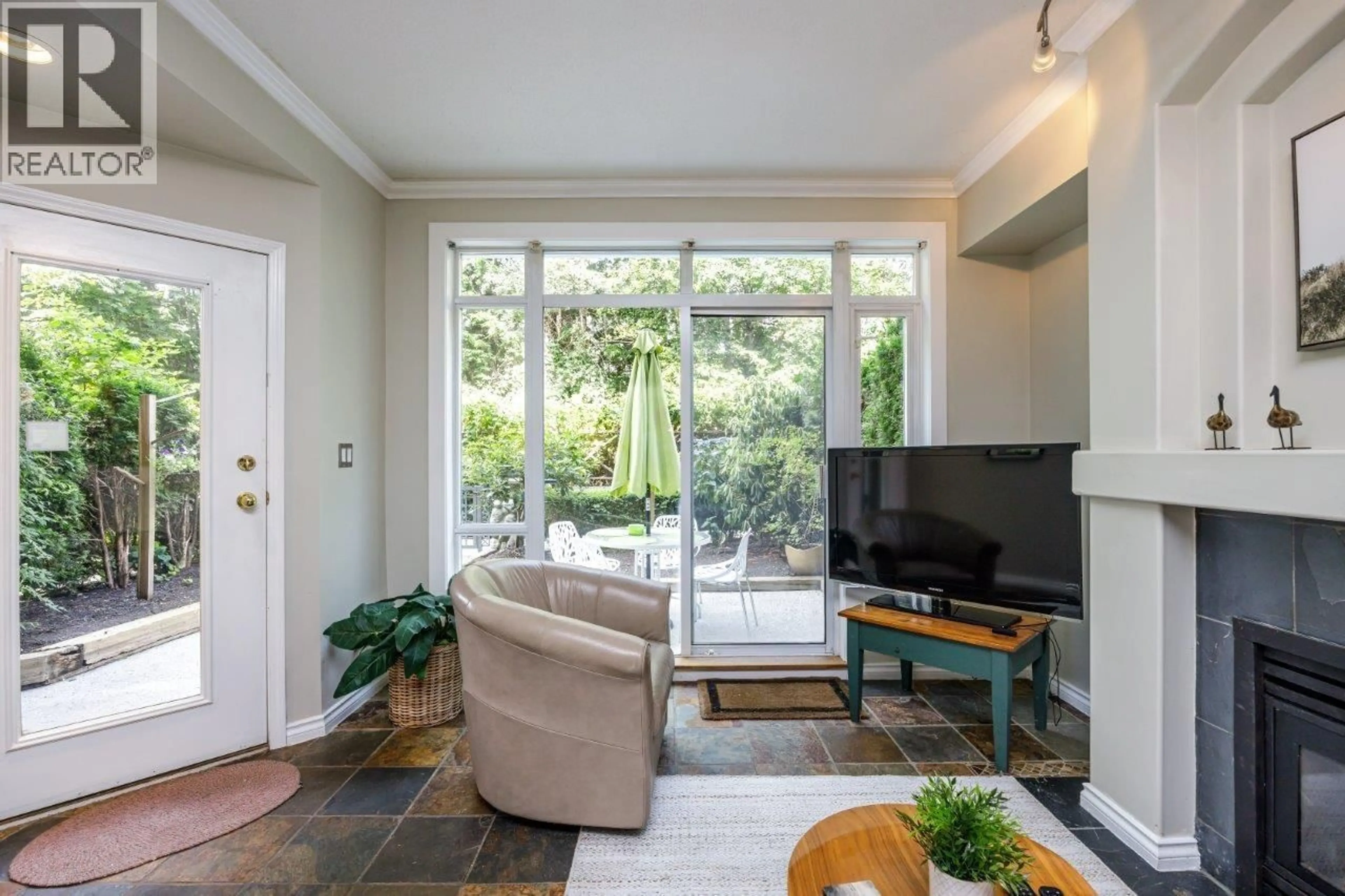 Living room with furniture, unknown for 211 - 3600 WINDCREST DRIVE, North Vancouver British Columbia V7G2S5