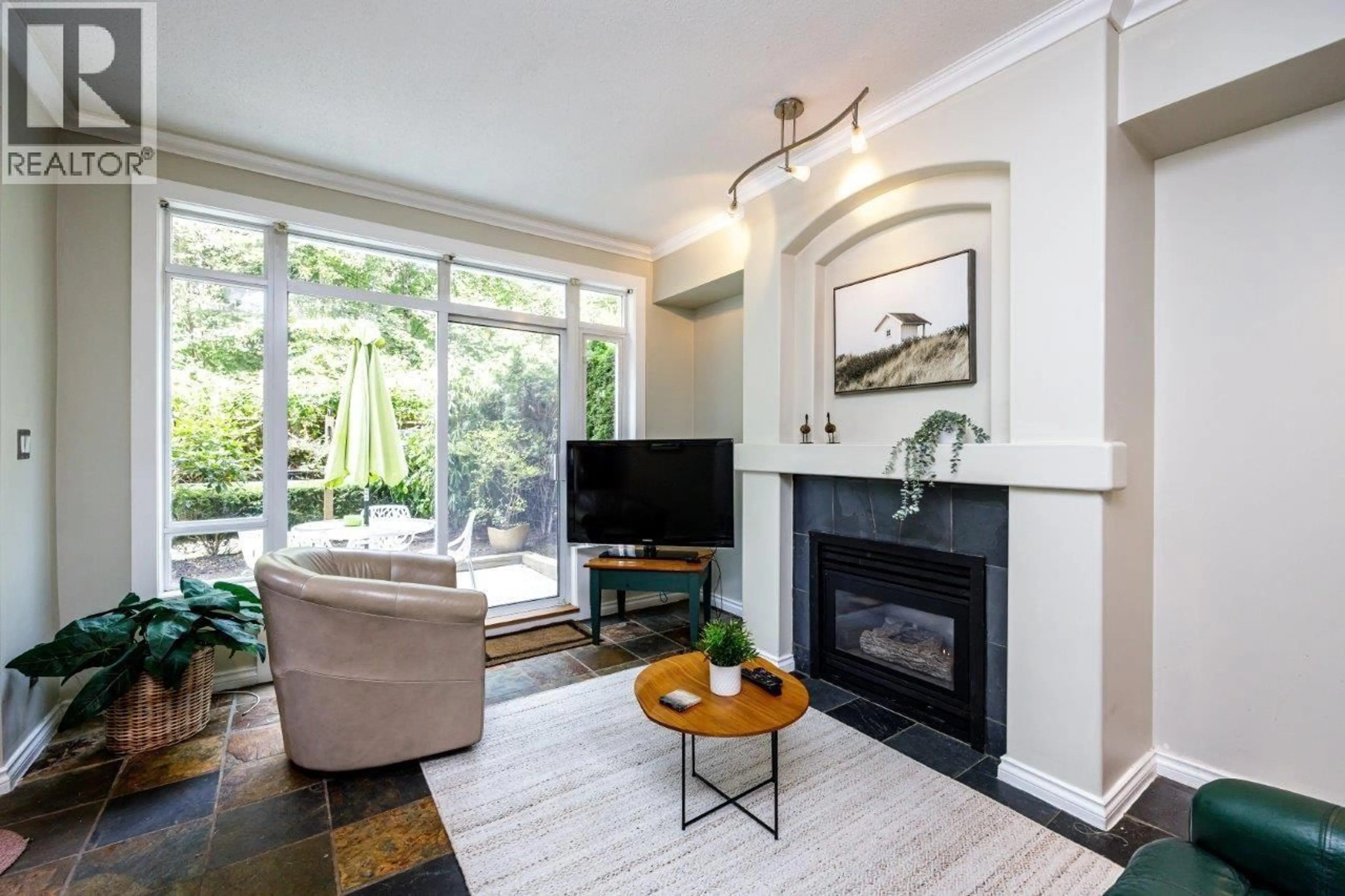 Living room with furniture, unknown for 211 - 3600 WINDCREST DRIVE, North Vancouver British Columbia V7G2S5