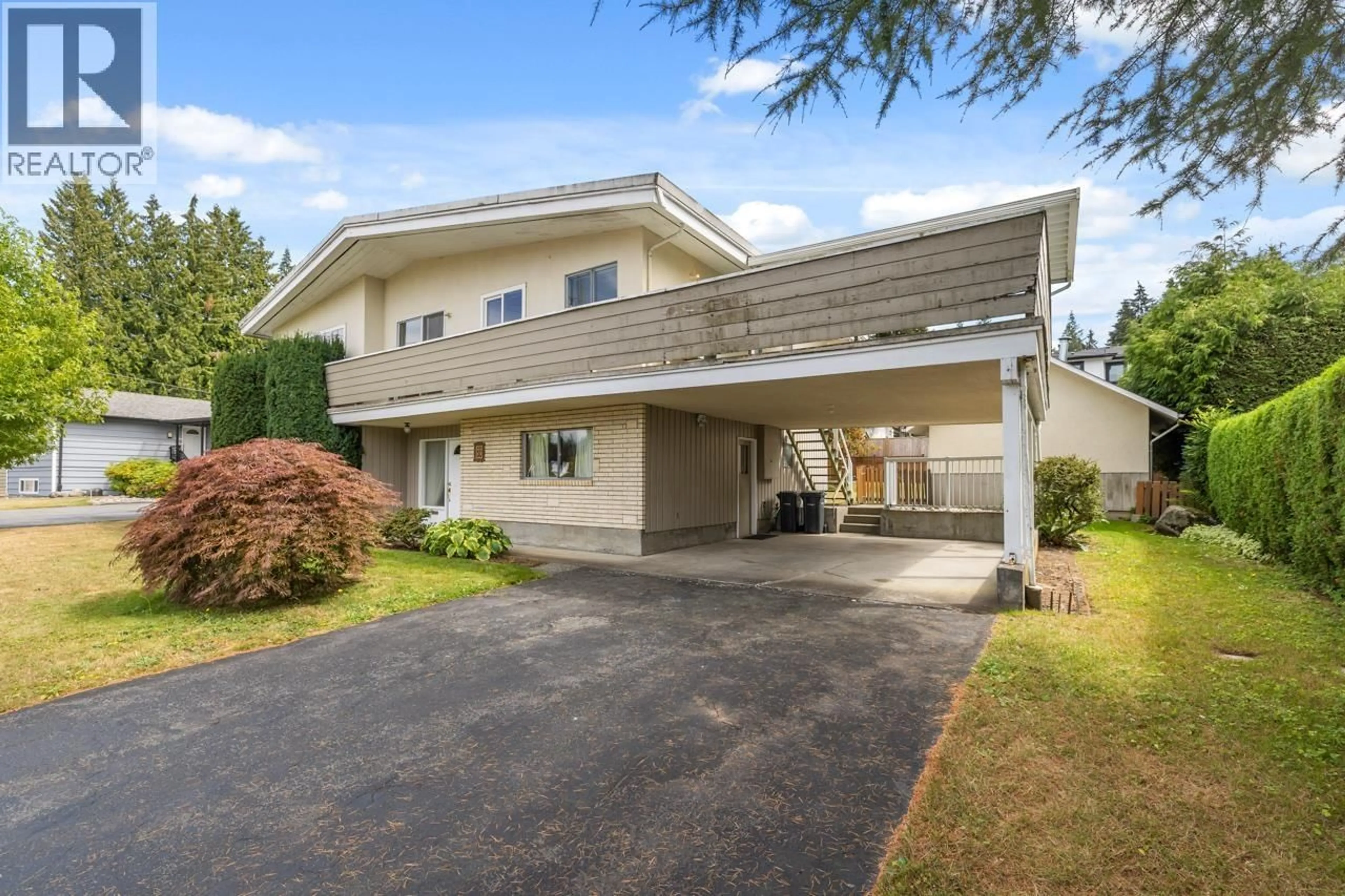 Home with vinyl exterior material, street for 879 THERMAL DRIVE, Coquitlam British Columbia V3J6R4