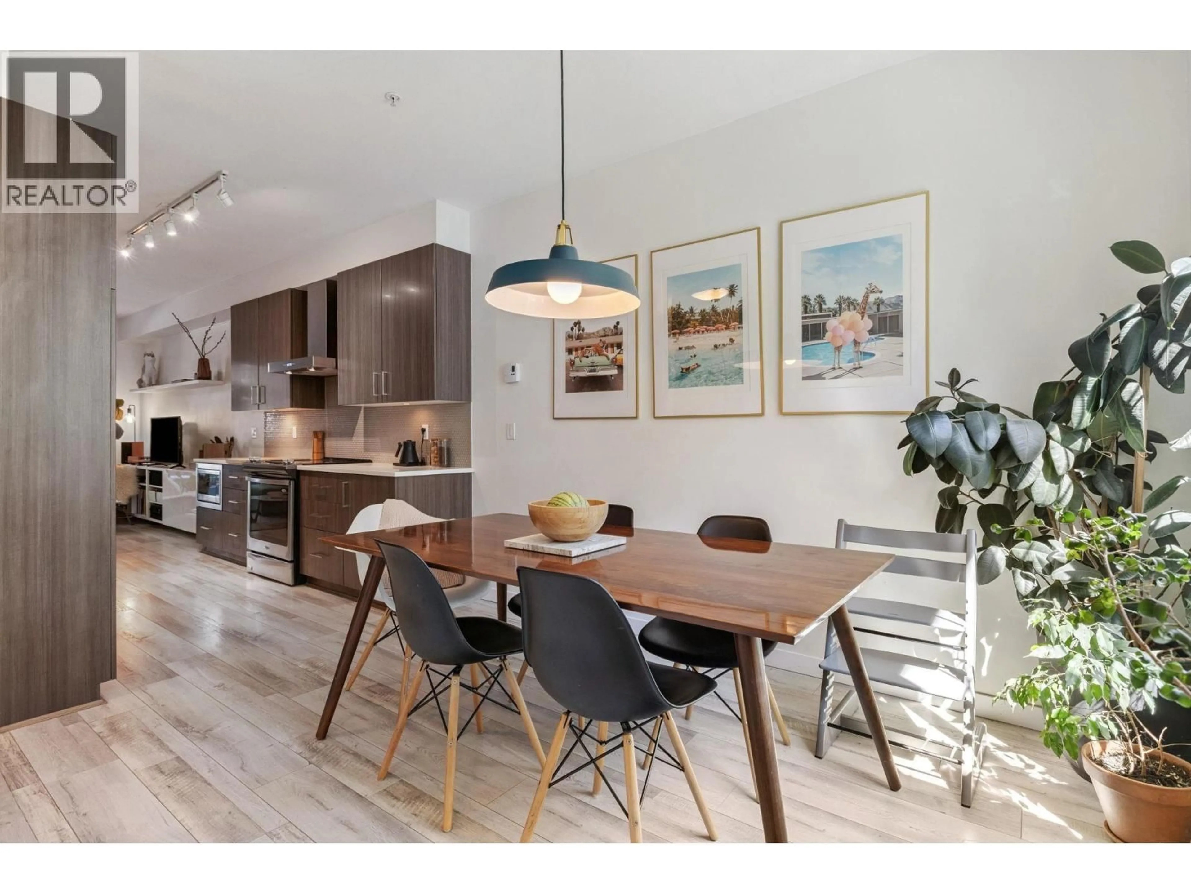 Open concept kitchen, wood/laminate floor for 8 - 433 SEYMOUR RIVER PLACE, North Vancouver British Columbia V7H0B8