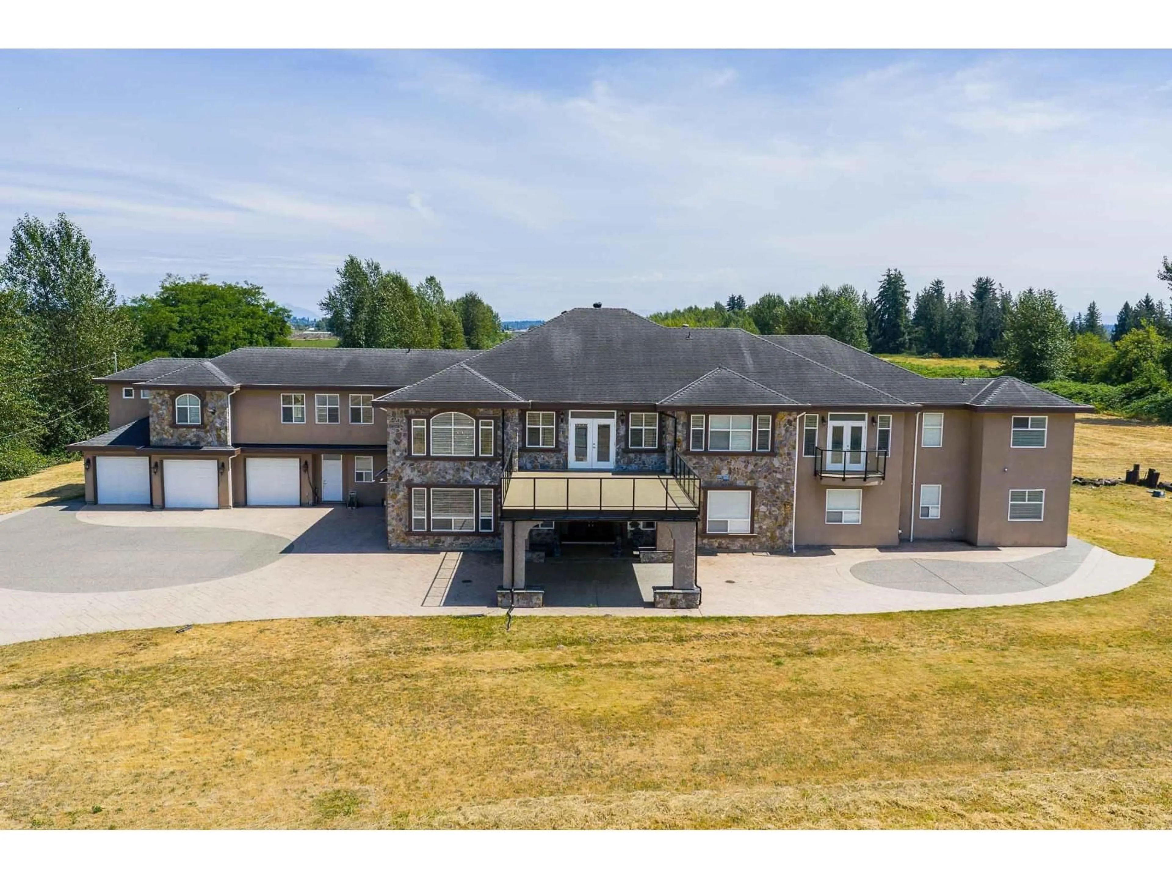 A pic from outside/outdoor area/front of a property/back of a property/a pic from drone, building for 4490 152, Surrey British Columbia V3Z1G8