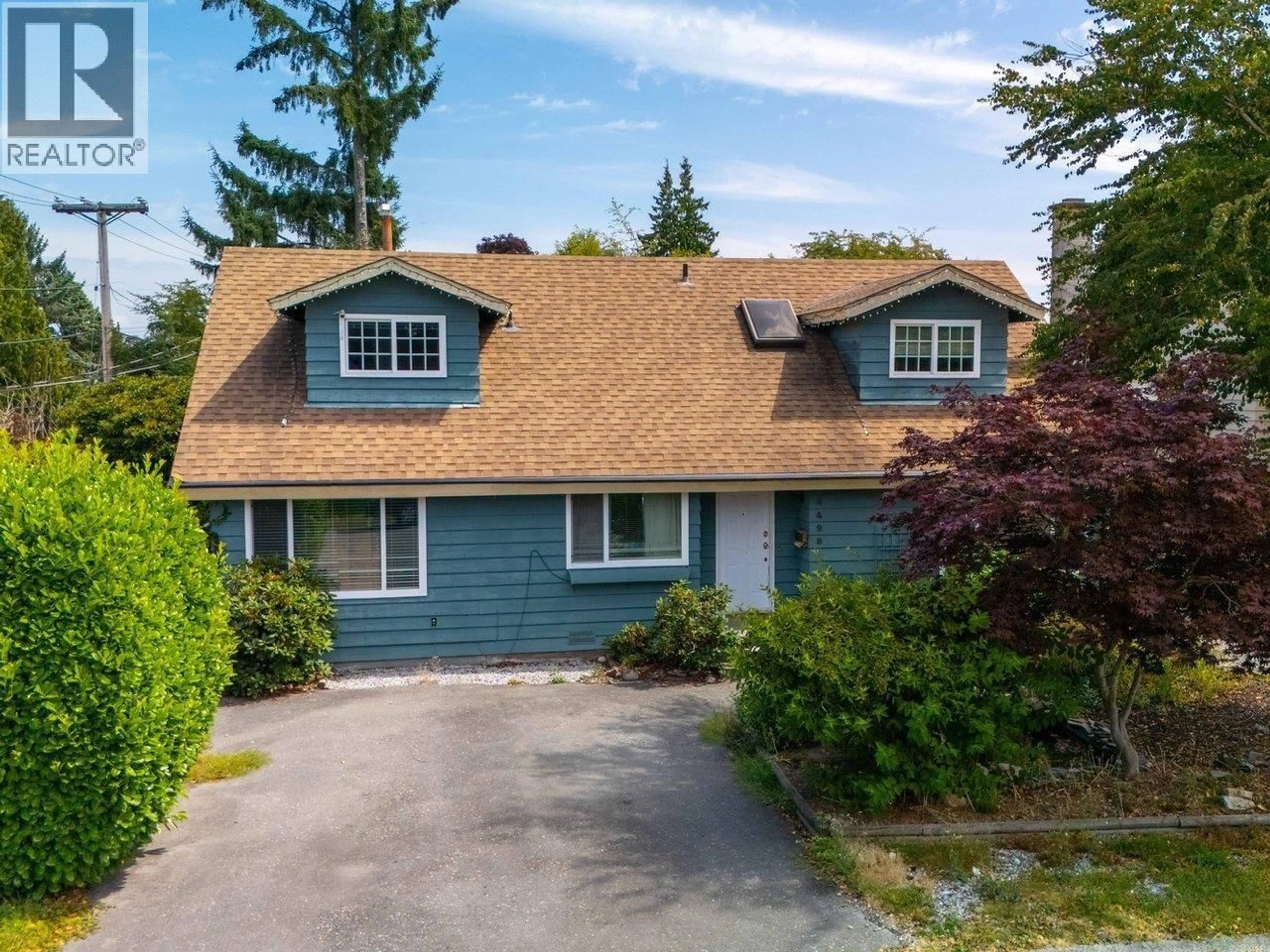 A pic from outside/outdoor area/front of a property/back of a property/a pic from drone, street for 4498 46B STREET, Delta British Columbia V4K2M9