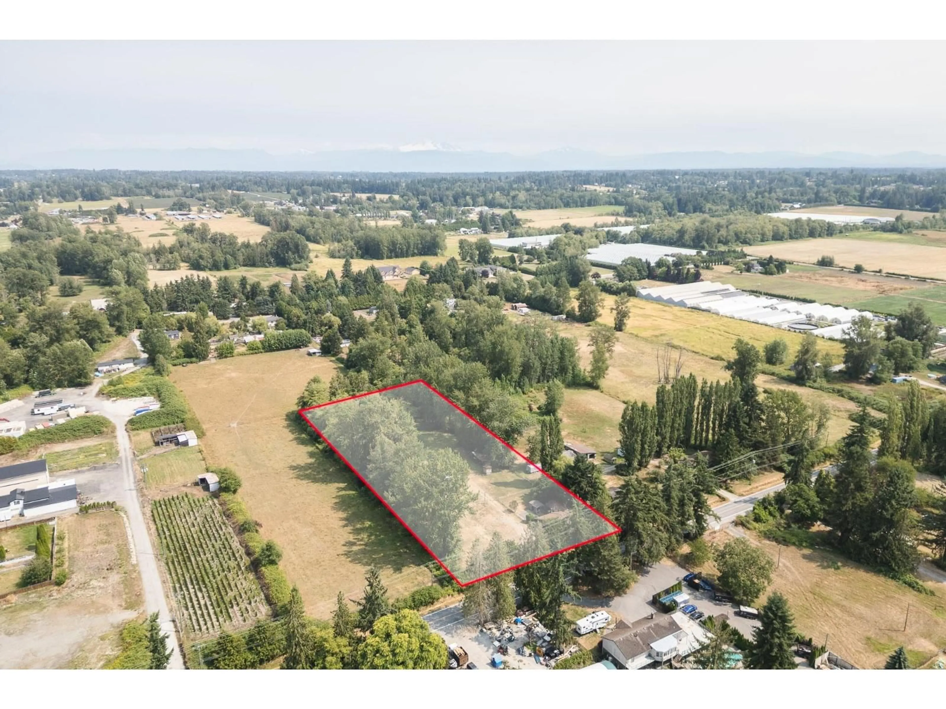 A pic from outside/outdoor area/front of a property/back of a property/a pic from drone, unknown for 2708 208, Langley British Columbia V2Z2B1