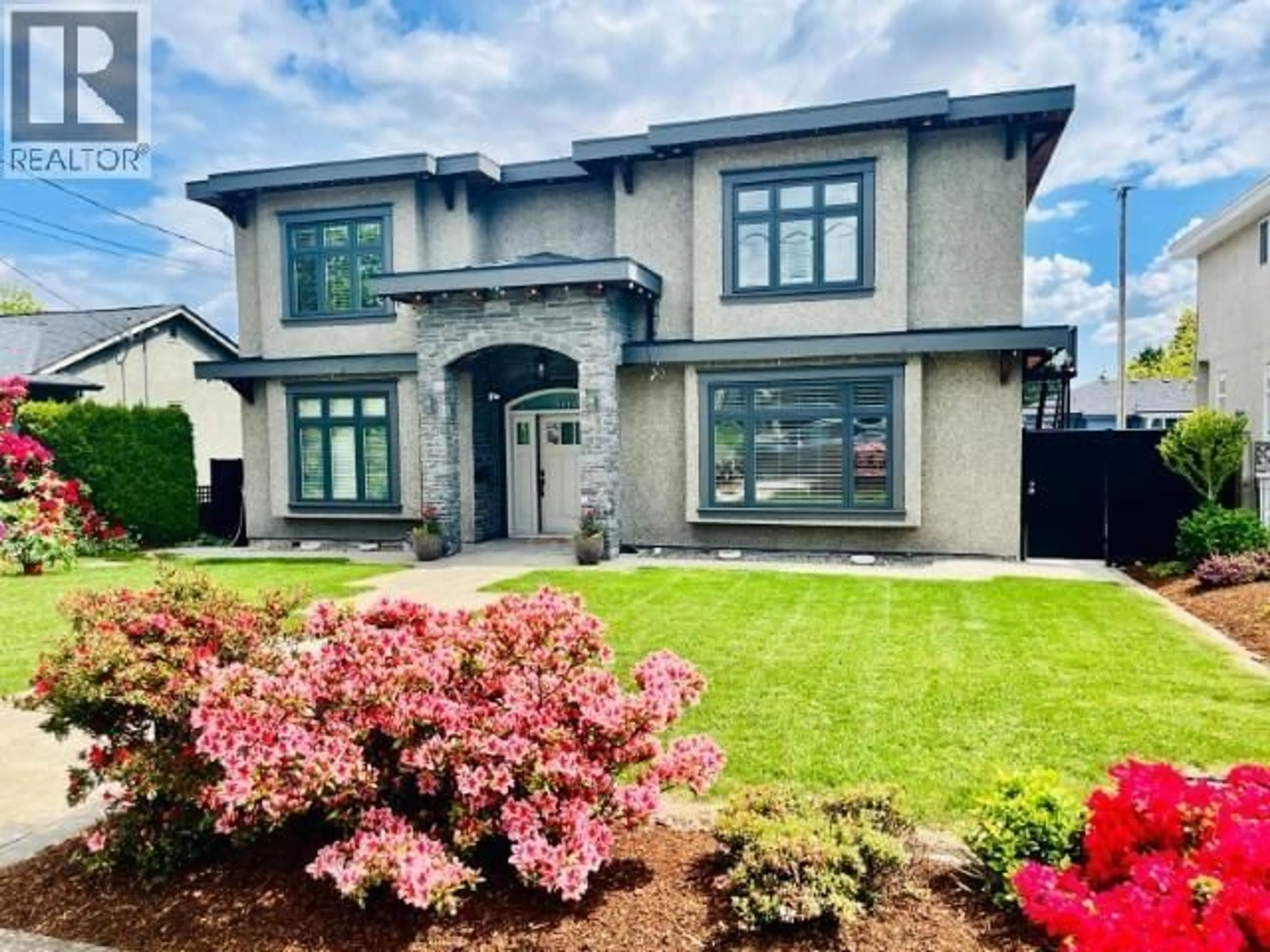 Home with brick exterior material, street for 7776 14TH AVENUE, Burnaby British Columbia V3N2A9