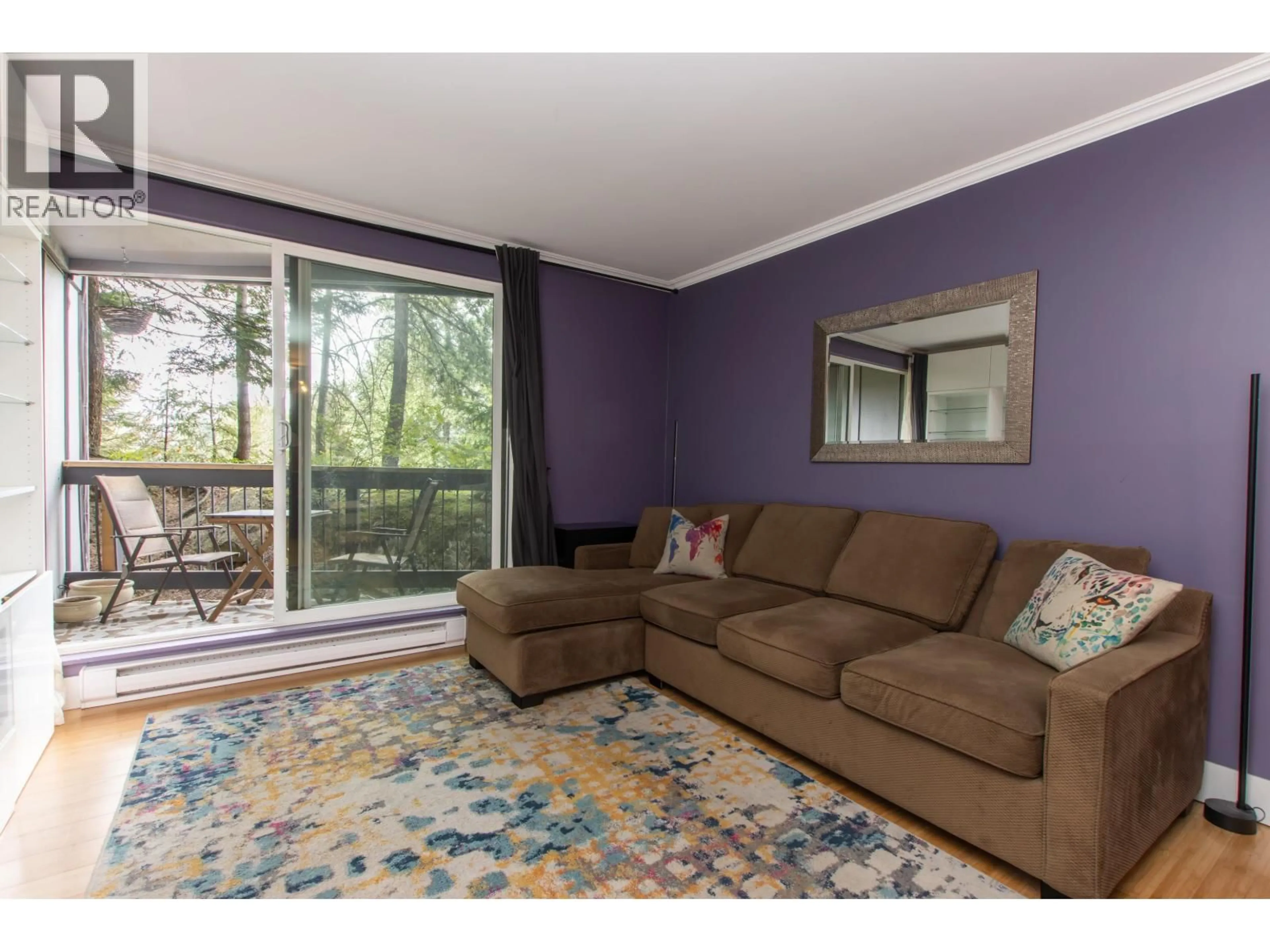 Living room with furniture, wood/laminate floor for 111 - 2109 WHISTLER ROAD, Whistler British Columbia V8B0A6