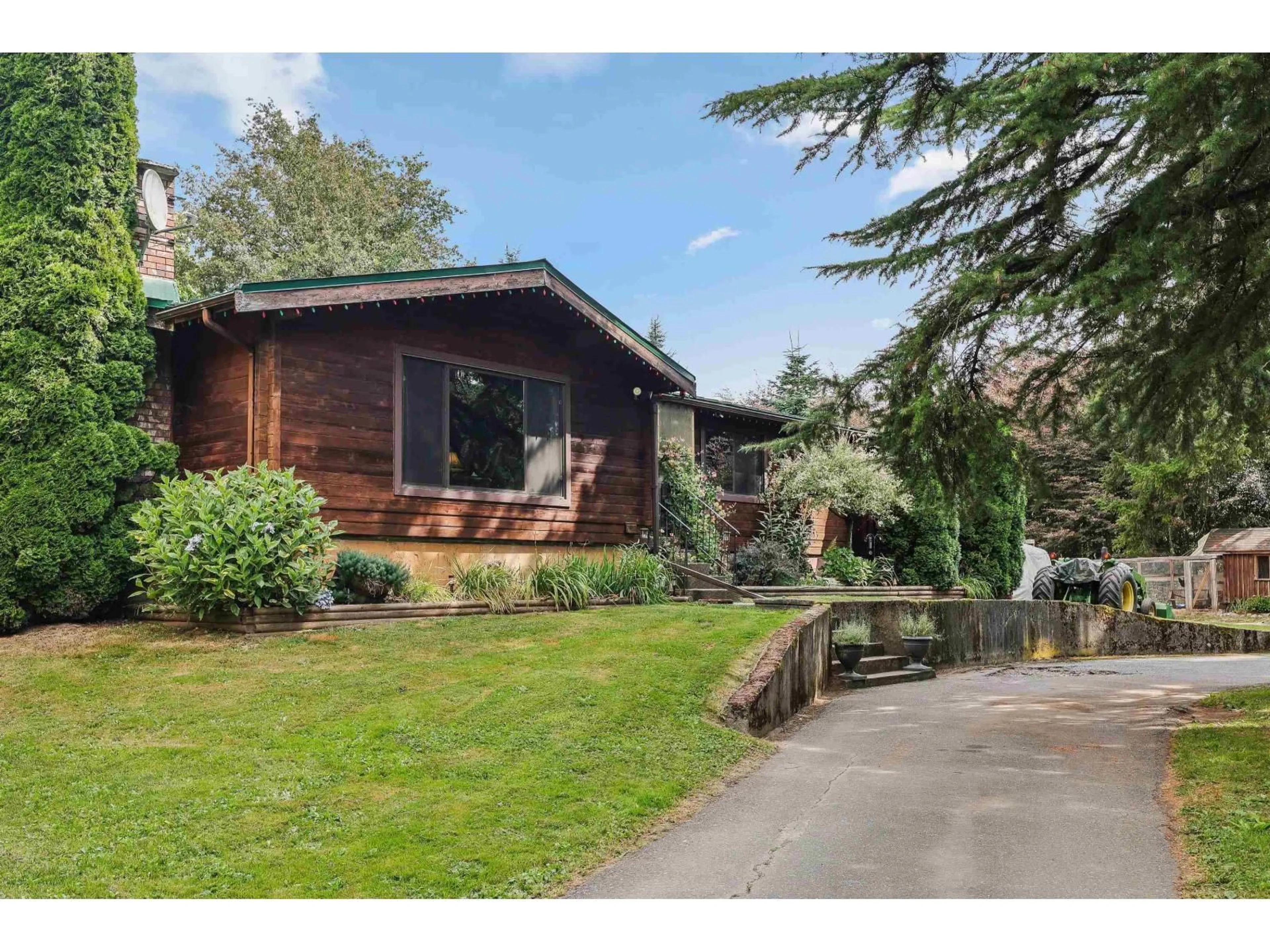 A pic from outside/outdoor area/front of a property/back of a property/a pic from drone, street for 4848 241, Langley British Columbia V2Z2M5