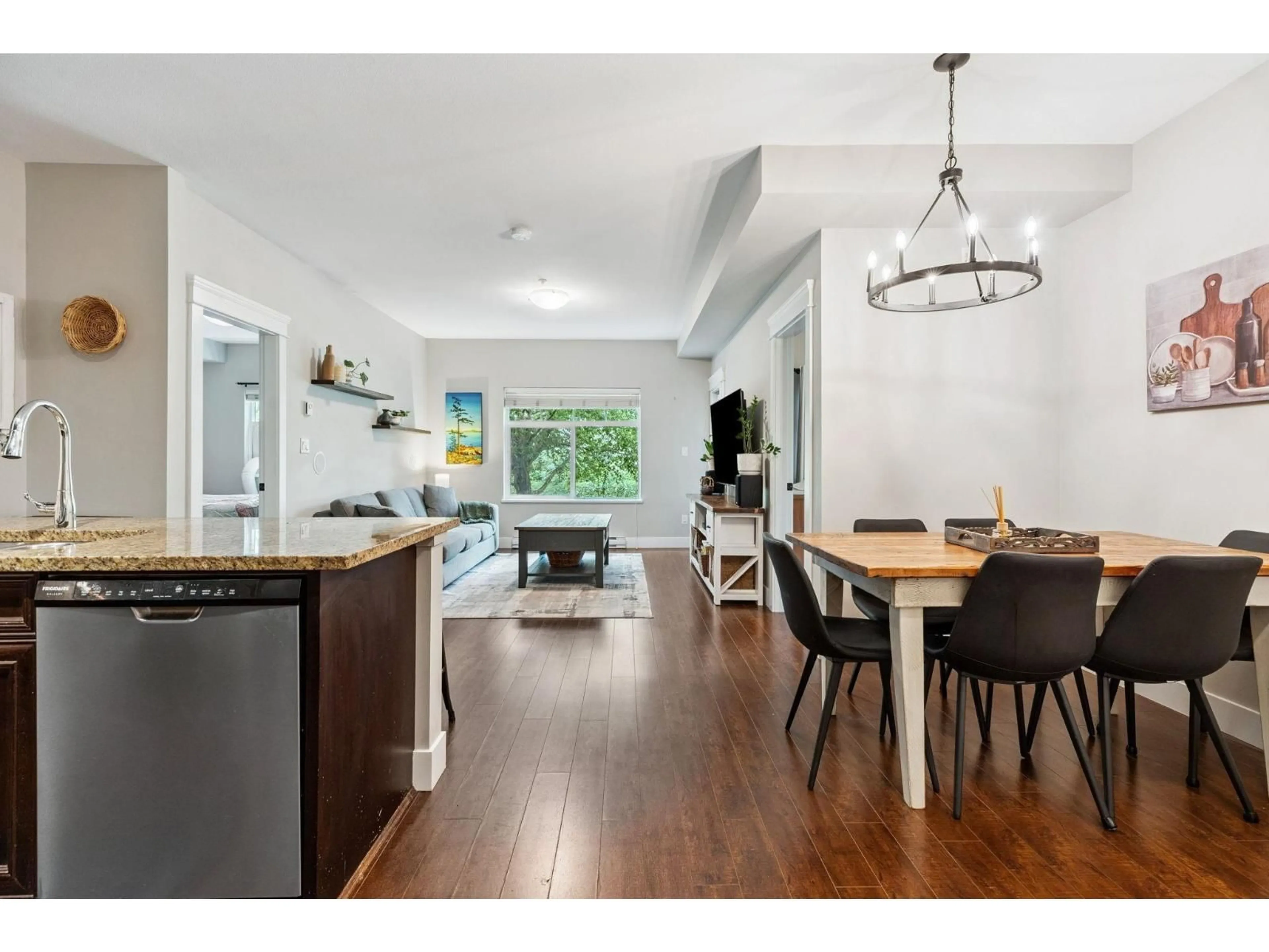 Open concept kitchen, wood/laminate floor for 202 - 19530 65, Surrey British Columbia V4N6M1